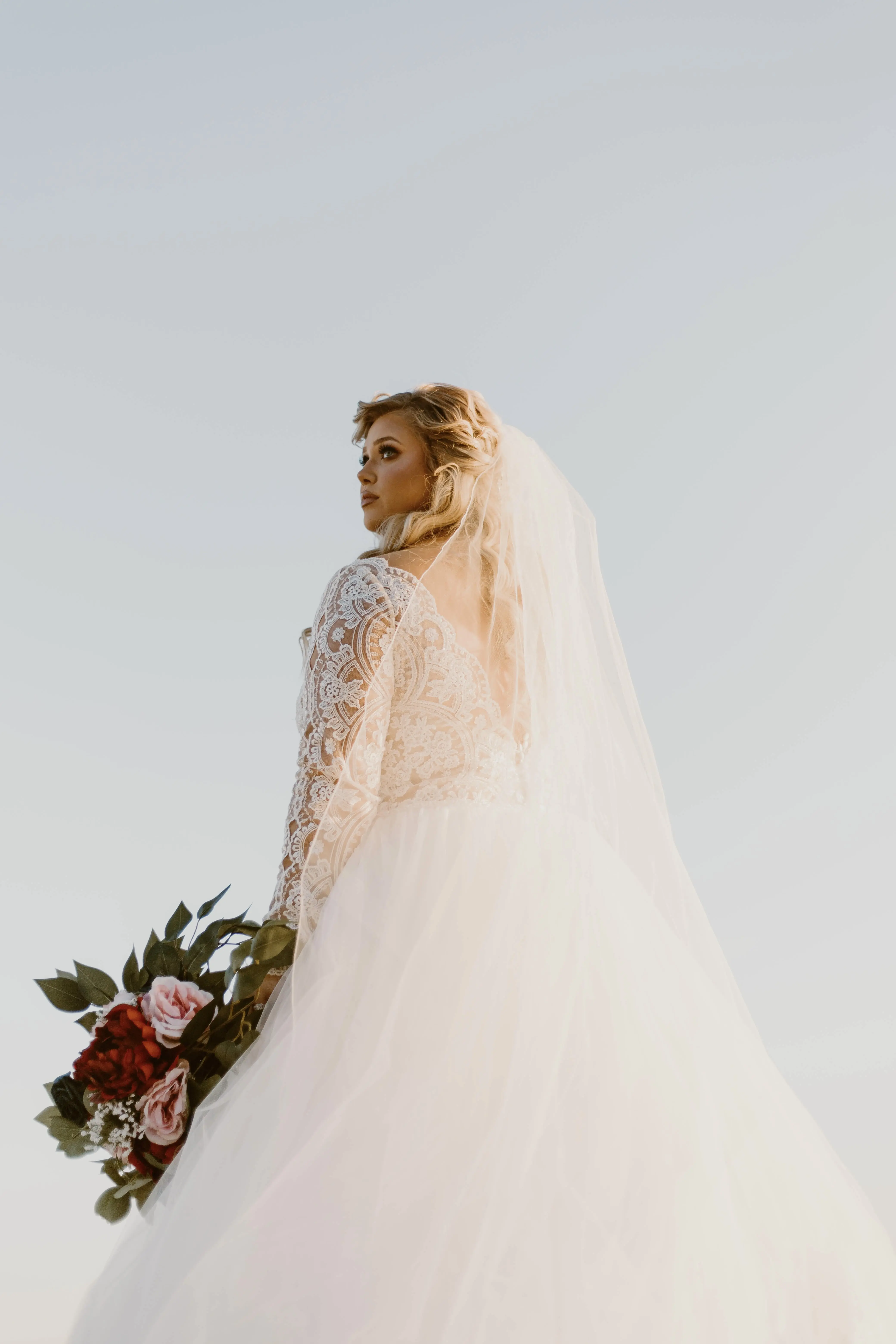 Bride In Long Sleeve Lace Ball Gown Wedding Dress Named Mallory Dawn By Maggie Sottero