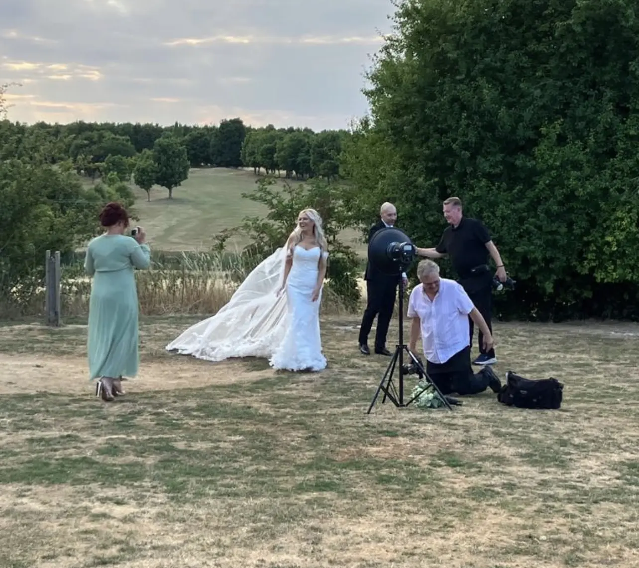 Bride Wearing Fit And Flare Lace Wedding Dress With 3D Floral Details Called Ryker By Sottero And Midgley