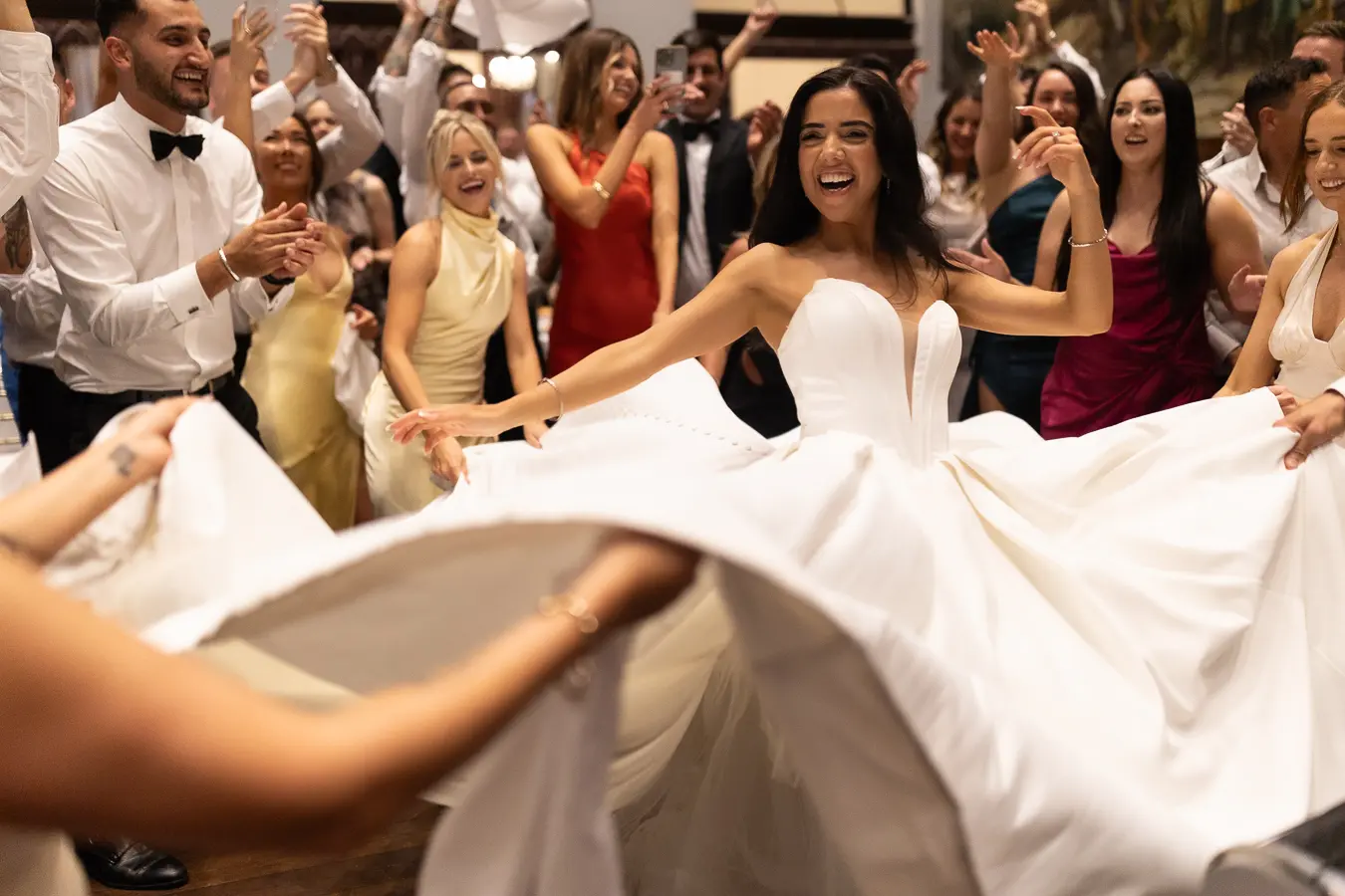 Bride wearing Derrick by Maggie Sottero dancing at her reception