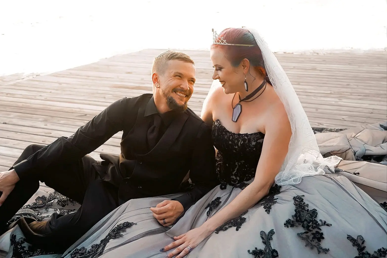 Bride Wearing Black Lace Wedding Dress Called Norvinia By Sottero and Midgley With Groom