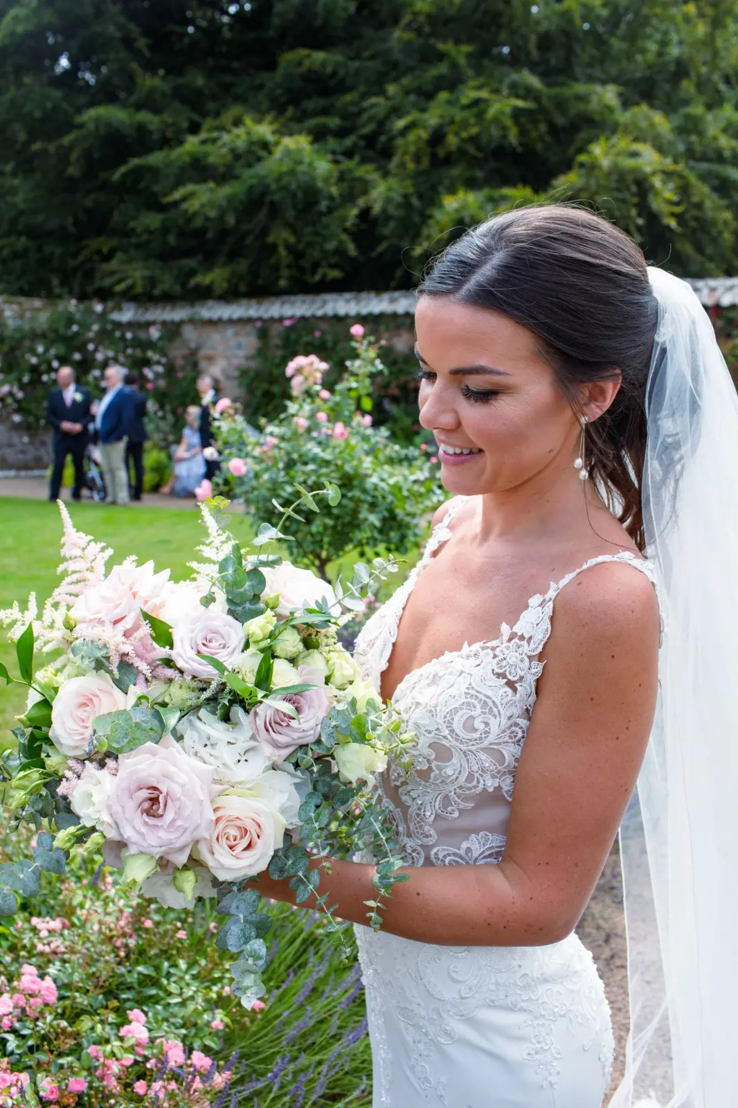 Bride wearing crepe sheath wedding dress