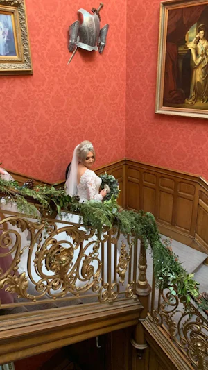 Bride Wearing Chic Lace Wedding Dress Called Iris By Rebecca Ingram