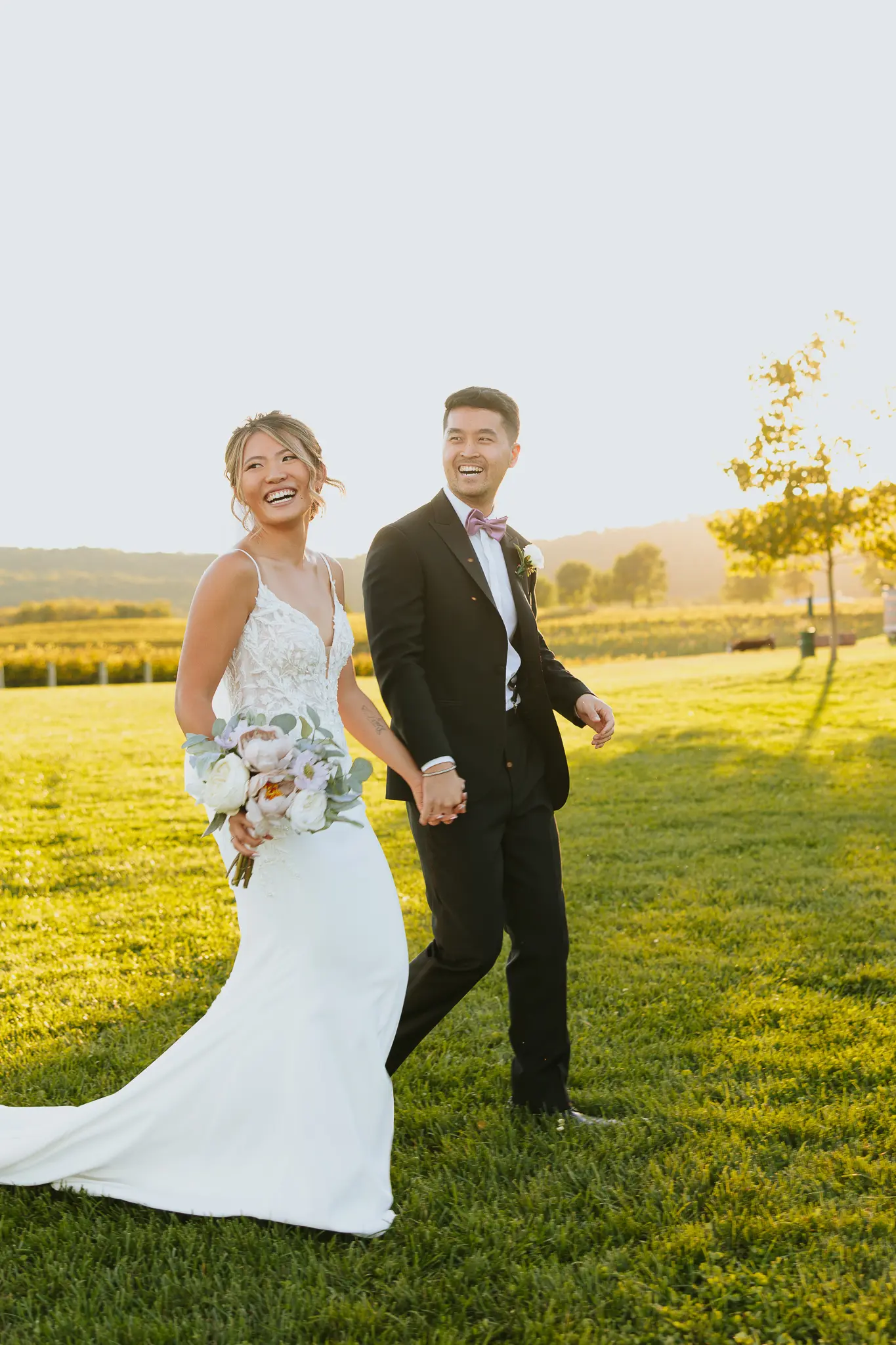 Bride In Lace Crepe Wedding Dress Called Alda By Rebecca Ingram With Groom
