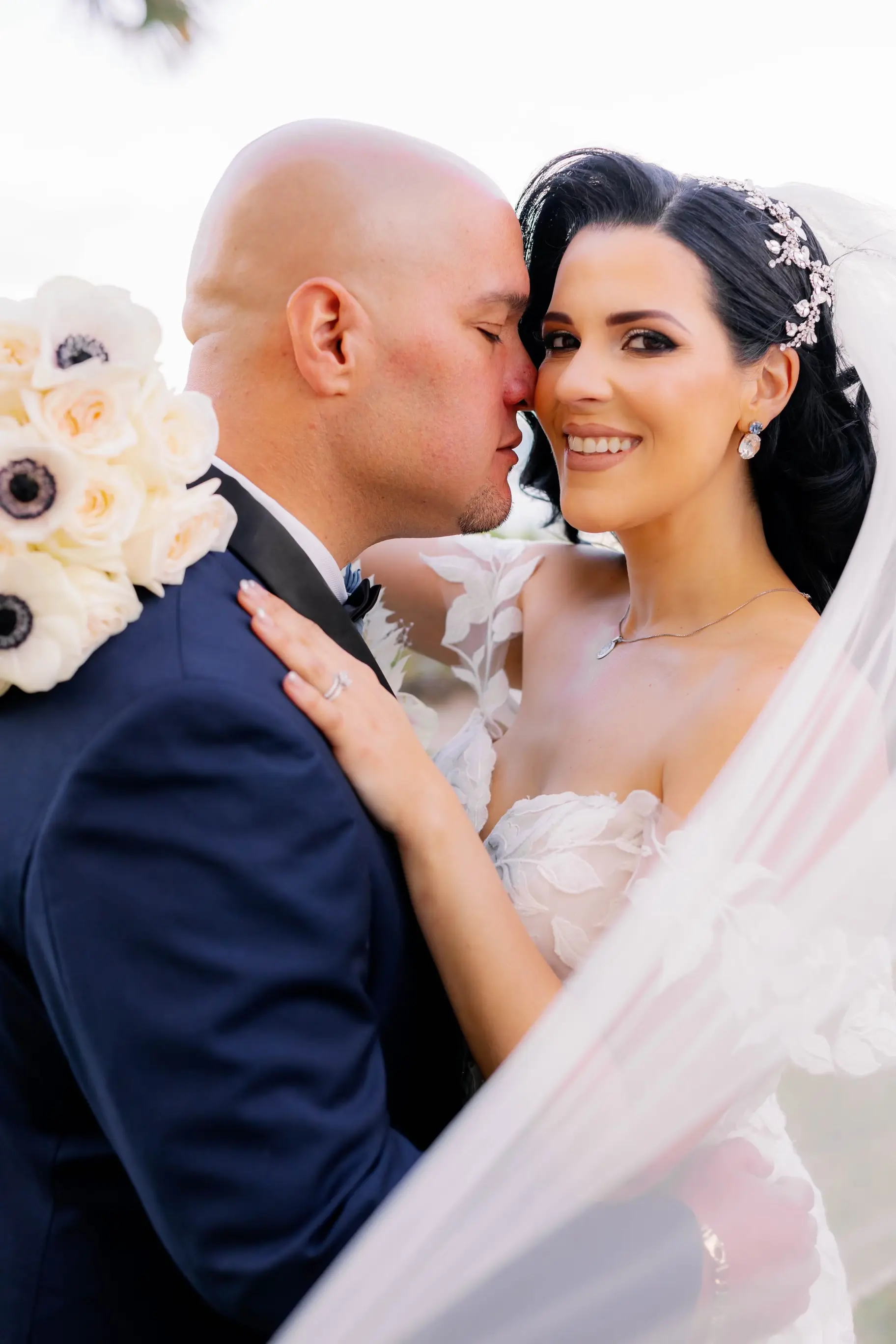 Bride Wearing Lace Mermaid Wedding Gown Called Hattie By Rebecca Ingram With The Groom