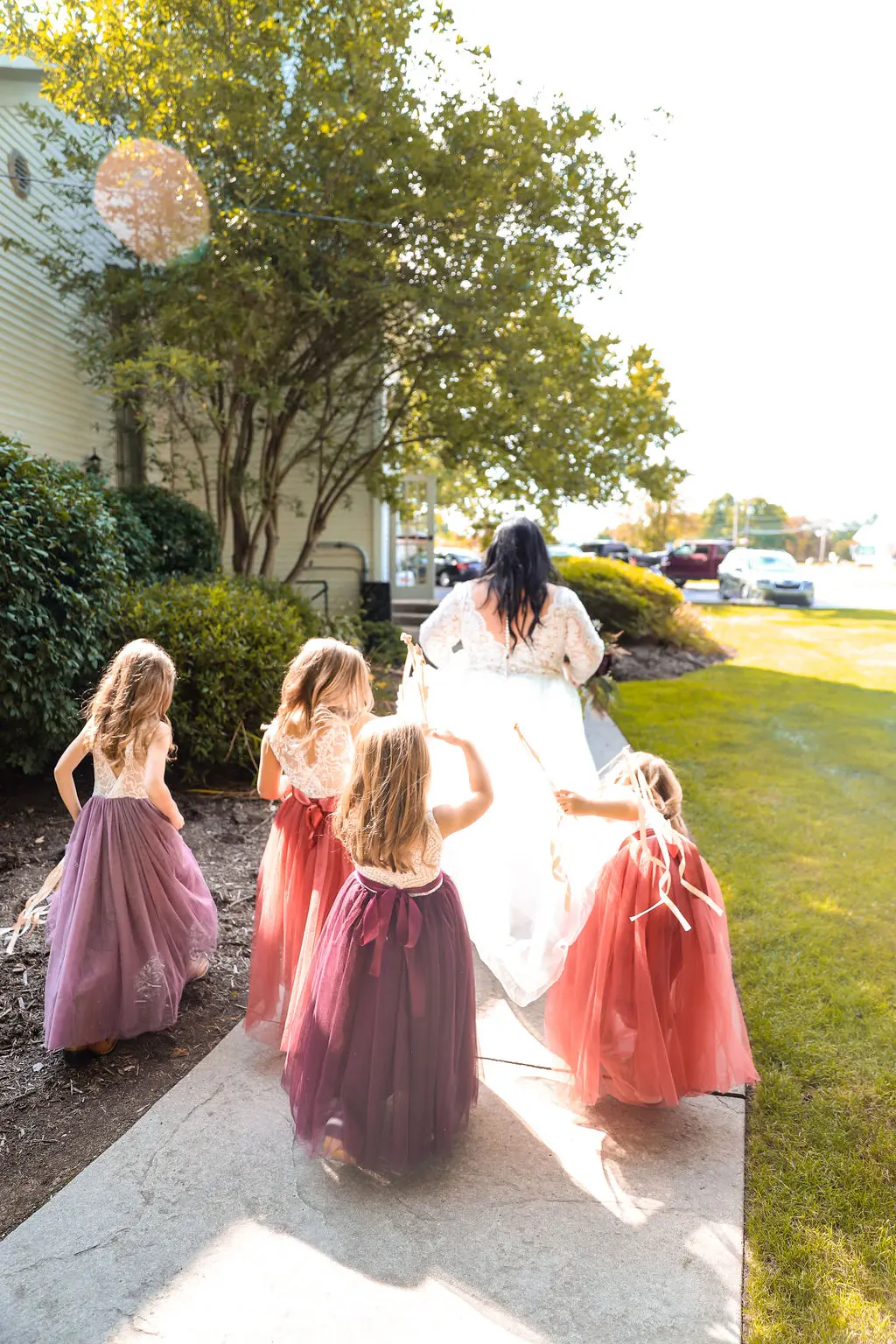Bride wearing Princess Ballgown Wedding Dress called Mallory Dawn by Maggie Sottero with her daughters