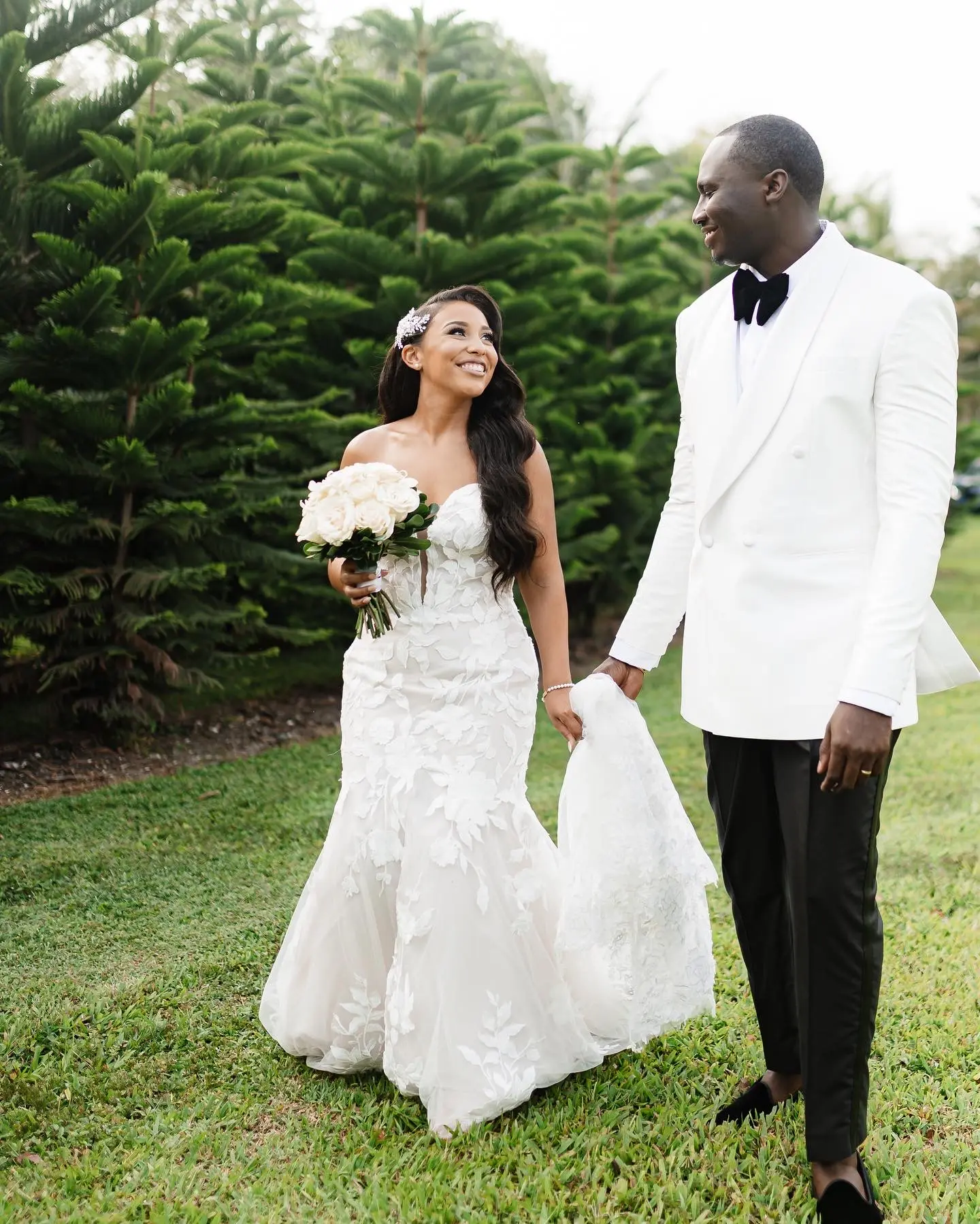 Real Bride in Strapless Mermaid Bridal Gown in Oversized Lace with Floral Lace Motifs over Sparkle Tulle and Sweetheart Neckline called Hattie by Rebecca Ingram
