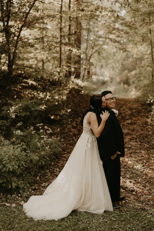Bride In Lace And Tulle Wedding Dress Called Minerva By Rebecca Ingram With Groom