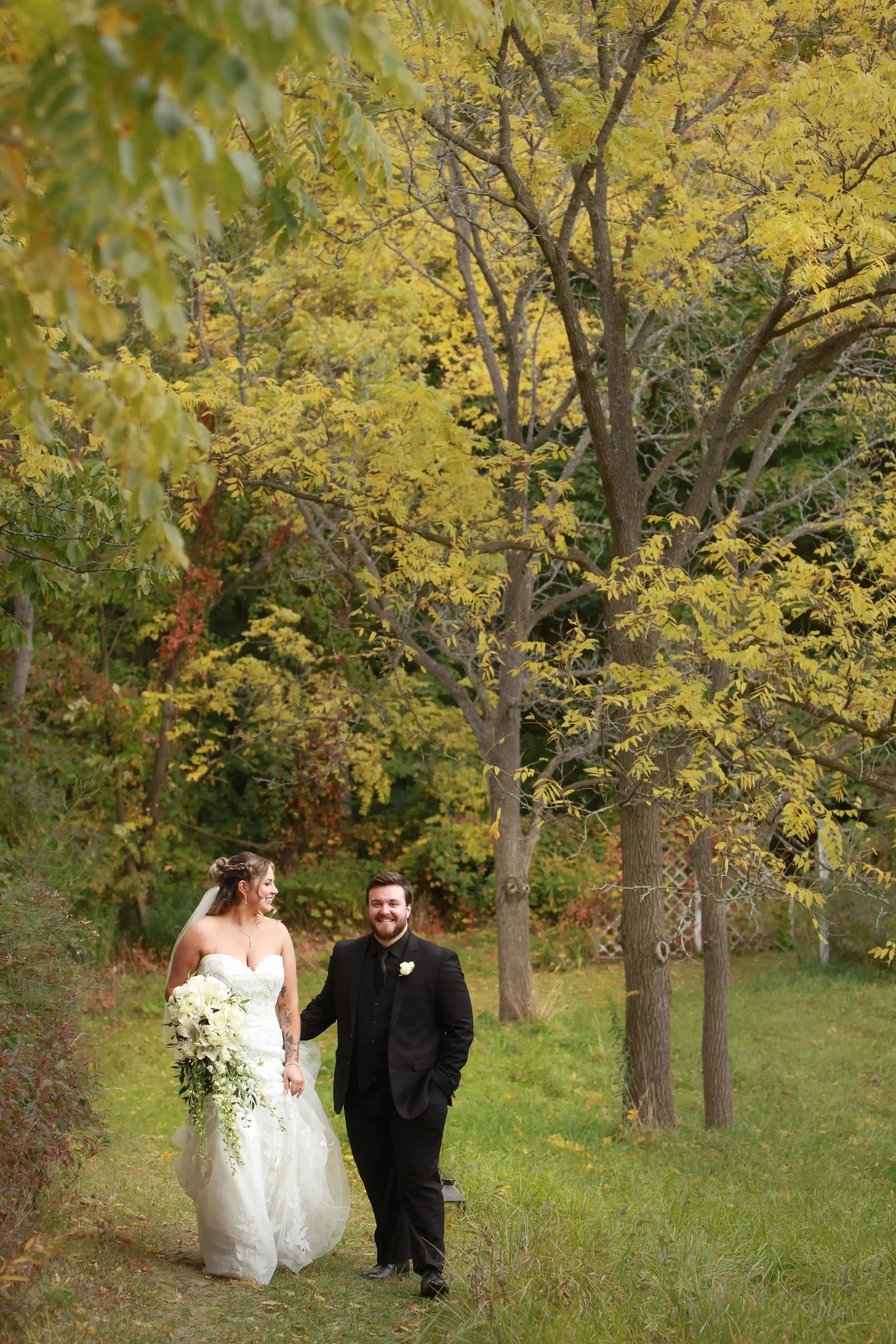 Groom with Real Bride in Strapless Mermaid Bridal Gown with Oversize Floral Lace Motifs Called Hattie by Rebecca Ingram