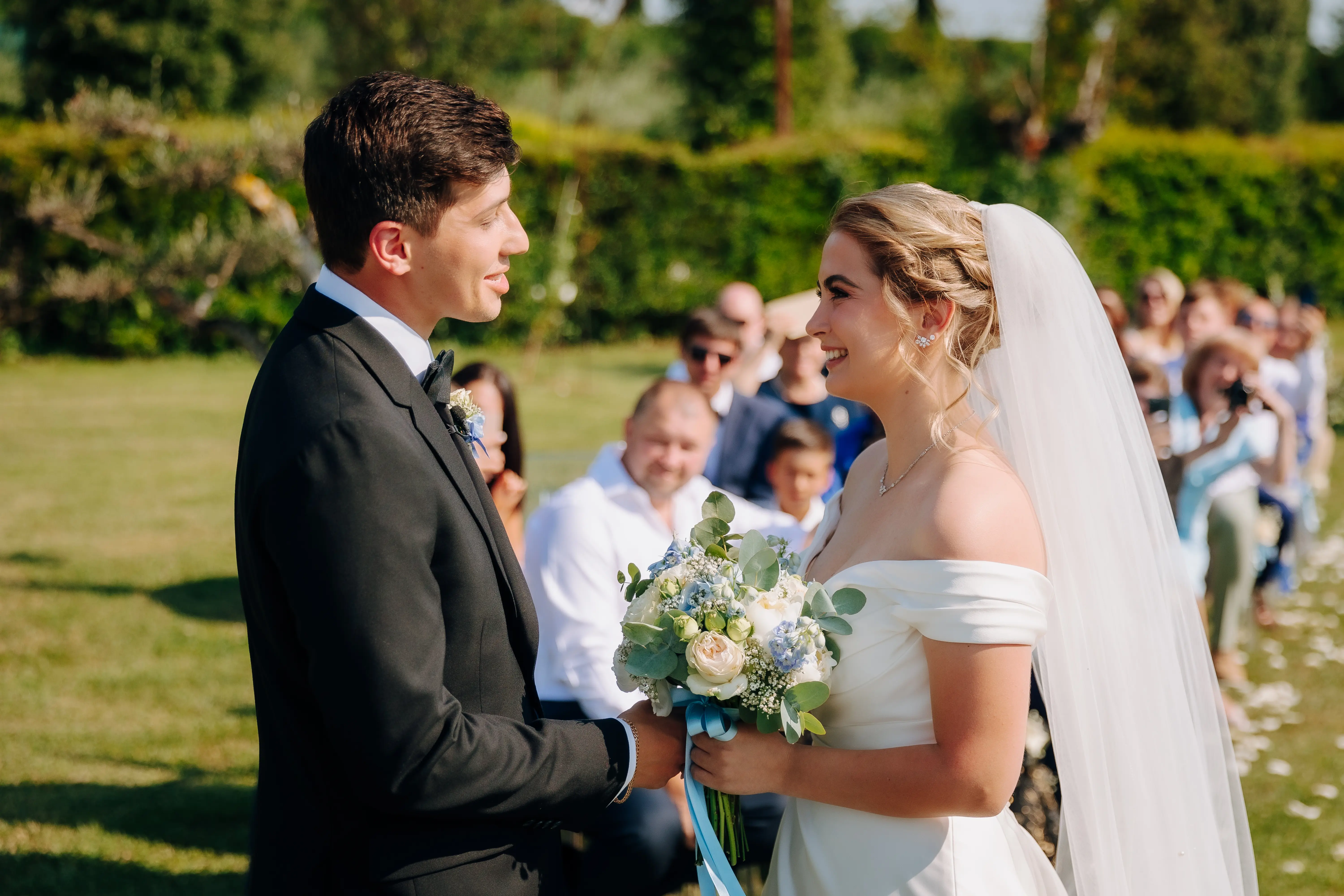 Bride Wearing A-line Classic Wedding Dress Ekaterina By Maggie Sottero Looking At Groom