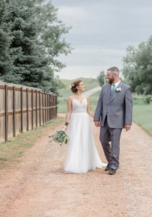 Groom With Bride Wearing Relaxed A-Line Wedding Dress Called Charlene By Maggie Sottero
