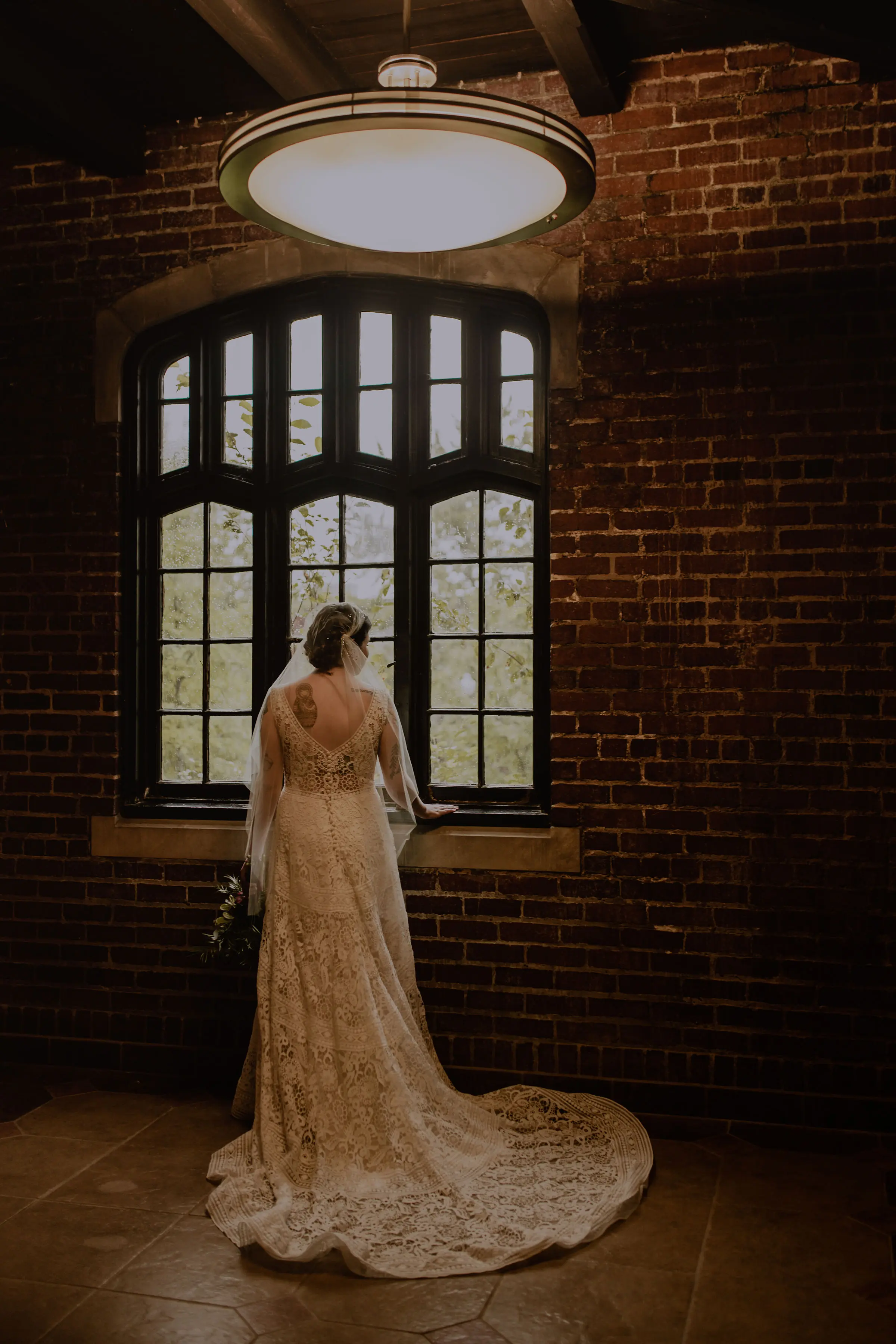 Bride Wearing Boho Lace Aline Wedding Gown Called Finley Dawn by Sottero and Midgley