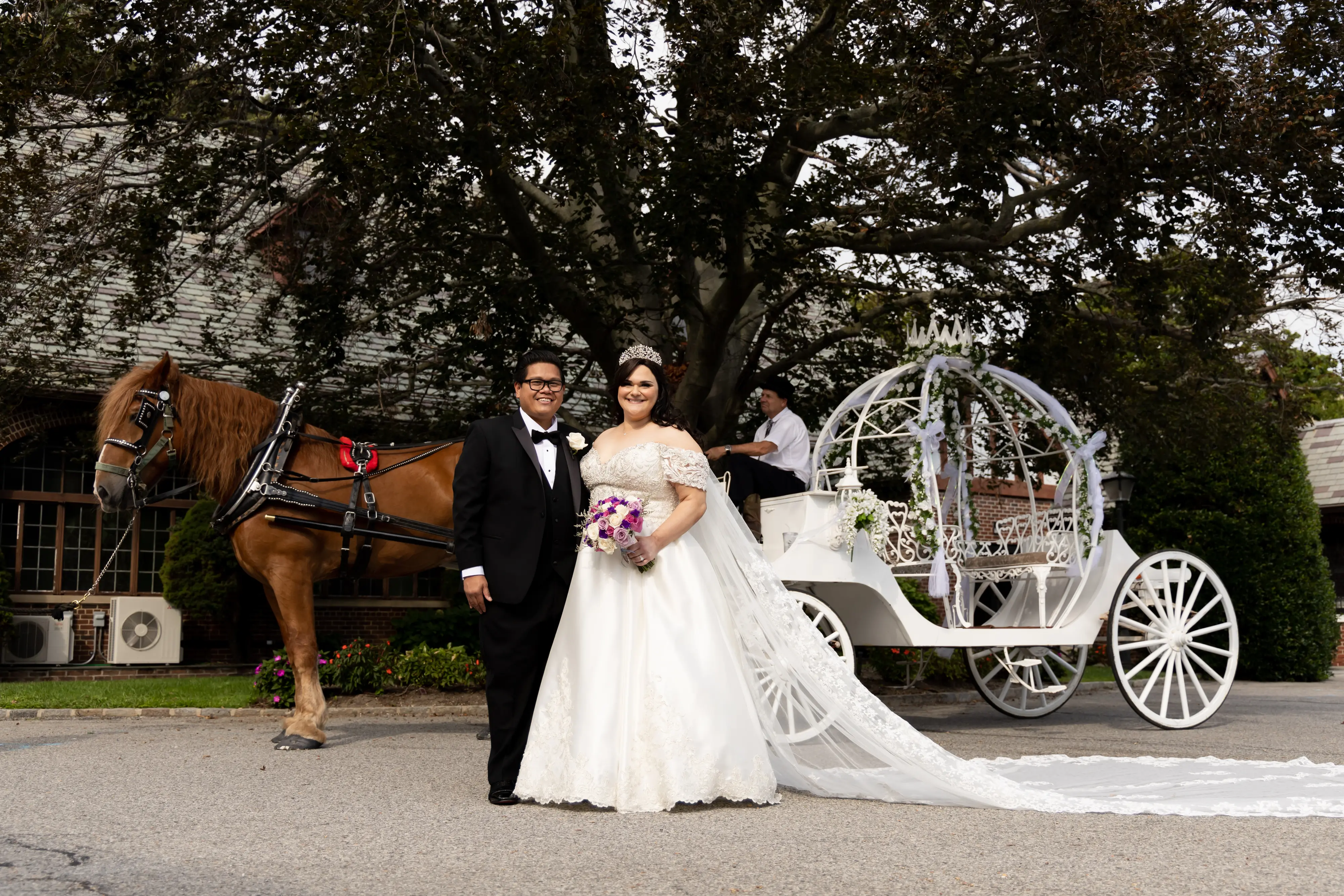 Bride in Satin Ball Gown Wedding Dress Featuring Decadent Beaded Lace Bodice, Kimora by Sottero & Midgley with Groom and Horse Drawn Carriage