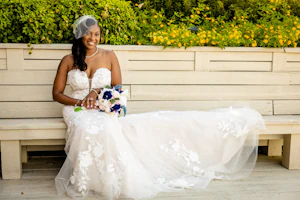 Bride Wearing Strapless Mermaid Wedding Dress With Oversized Lace Hattie By Rebecca Ingram