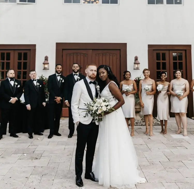 Groom With Bride Wearing Lace A-line Raelynn By Rebecca Ingram