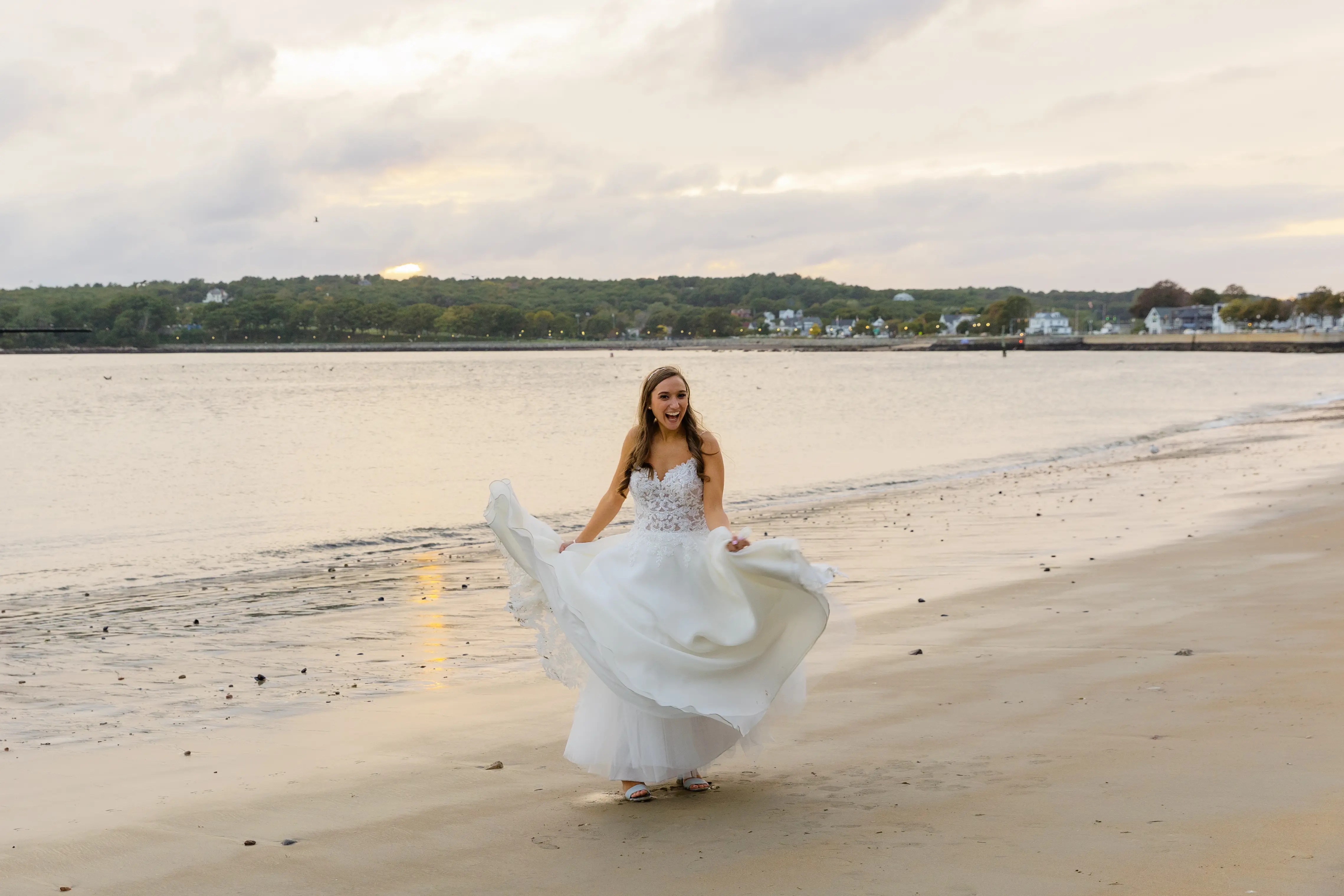 Bride in Flirty A-Line Wedding Dress with Beaded Lace Motifs and Sheer Bodice Called Savannah by Maggie Sottero