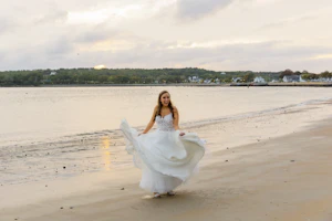 Bride in Flirty A-Line Wedding Dress with Beaded Lace Motifs and Sheer Bodice Called Savannah by Maggie Sottero