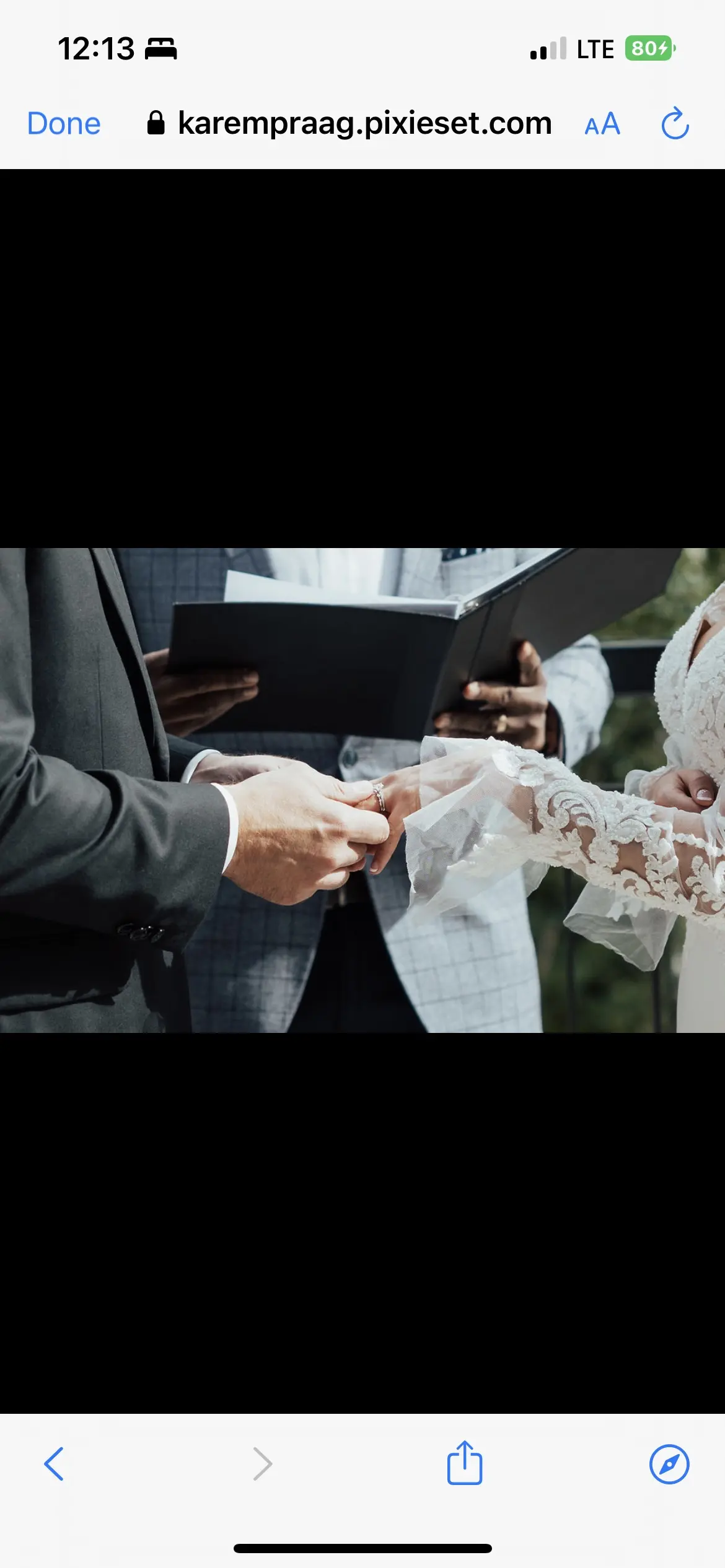 Bride Wearing Long Sleeve Lace Wedding Dress Exchanging Rings Outdoors.