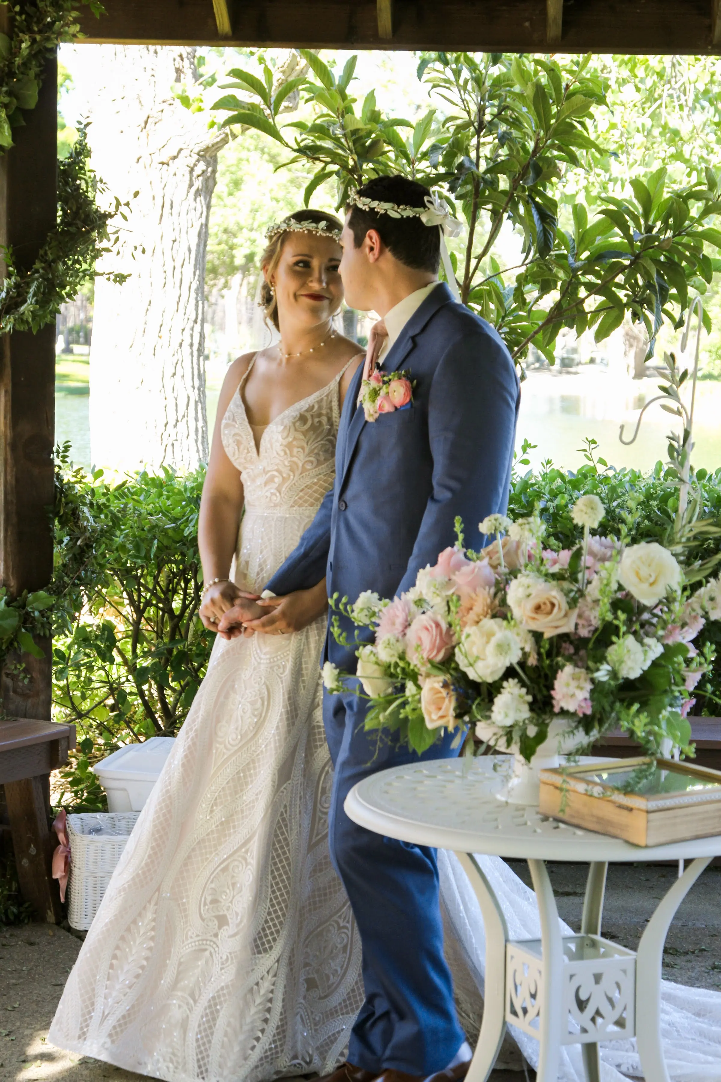 bride in deep v-neckline  wedding dress called roxanne by sottero and midgley with groom