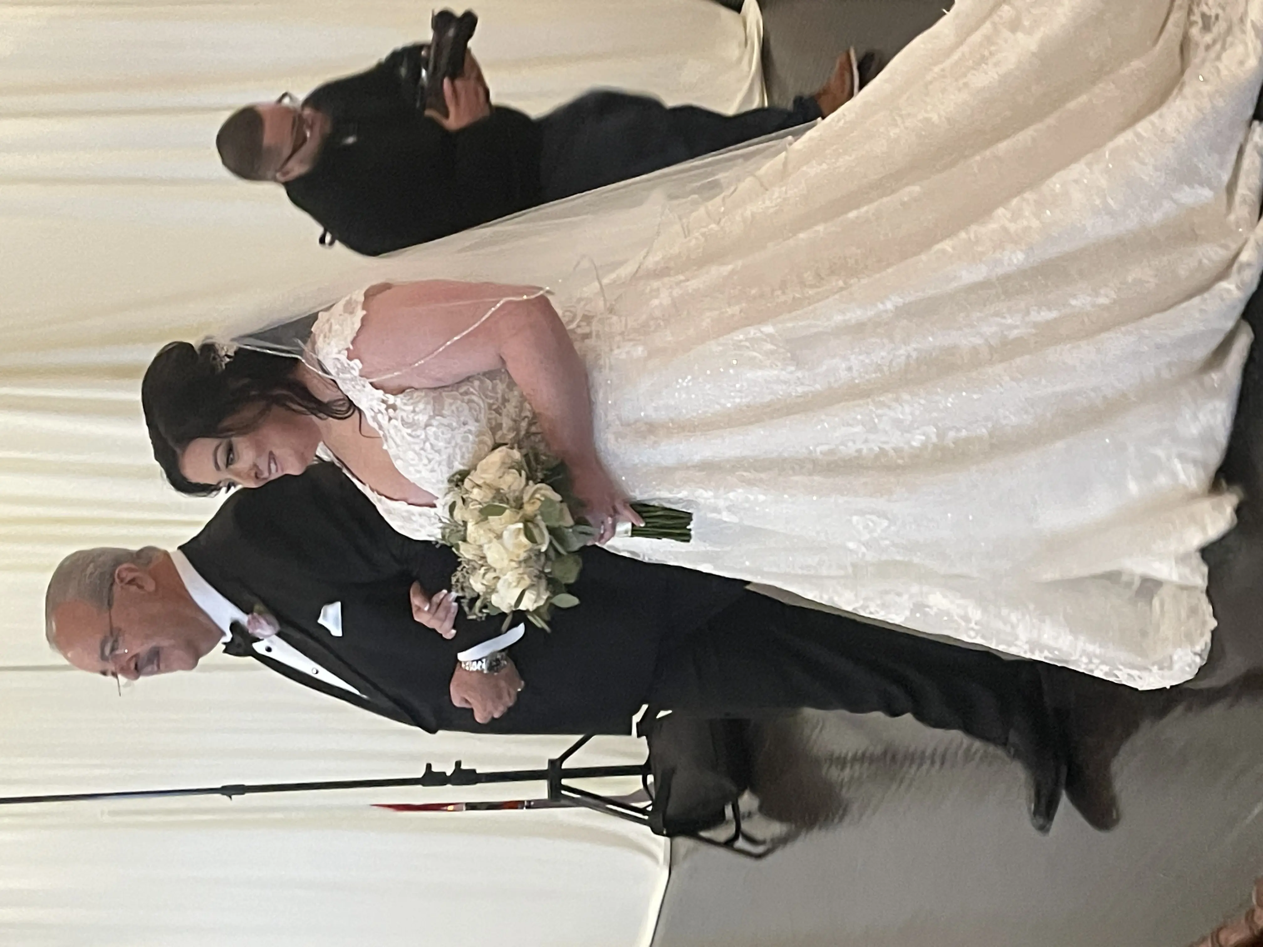 Bride Wearing Lace Ballgown Wedding Dress Called Kiernan By Sottero And Midgley Walking Down The Aisle