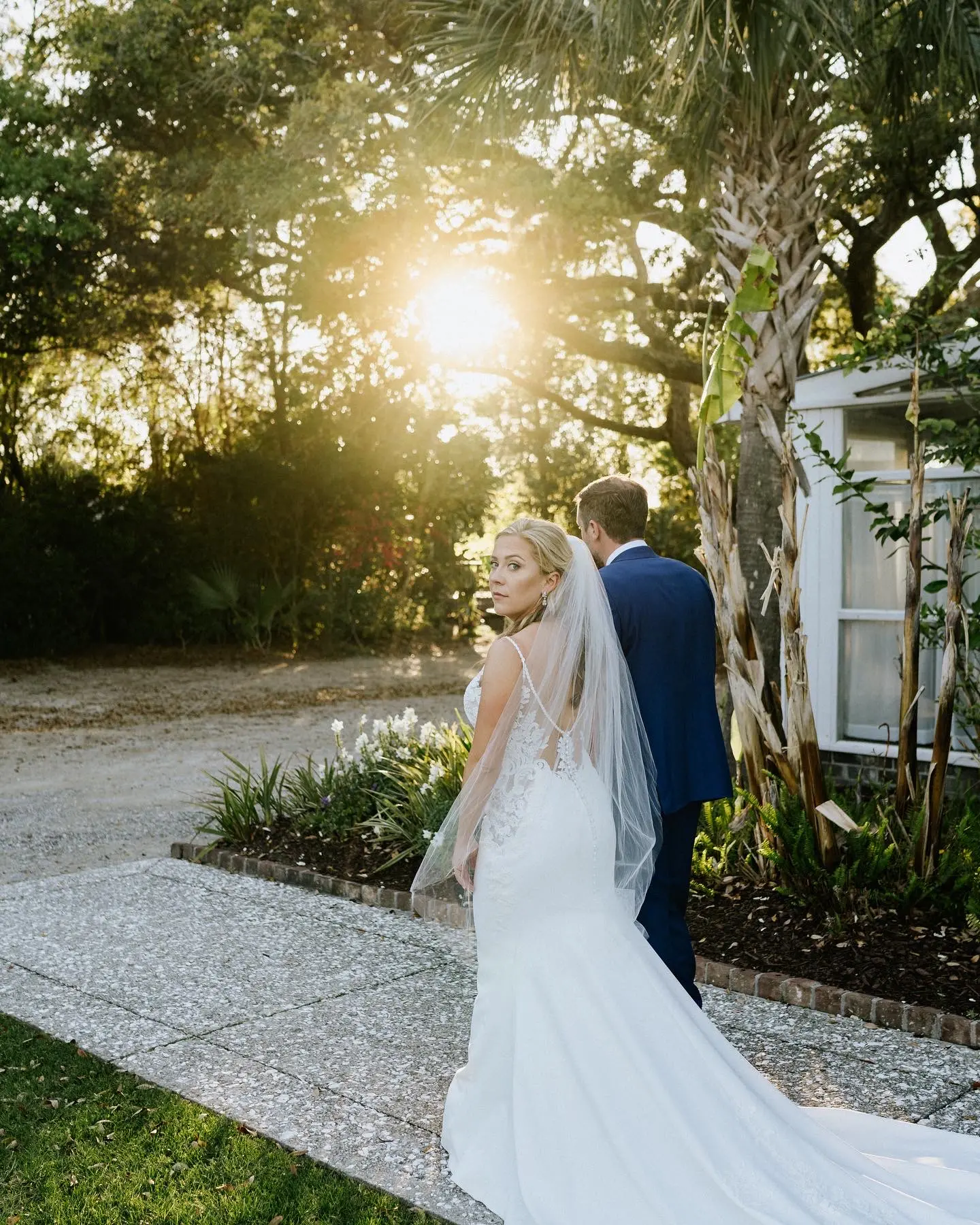 Groom Walking With Bride In A Stunning Lace Spaghetti Strap Mermaid Wedding Dress Named Nikki By Maggie Sottero
