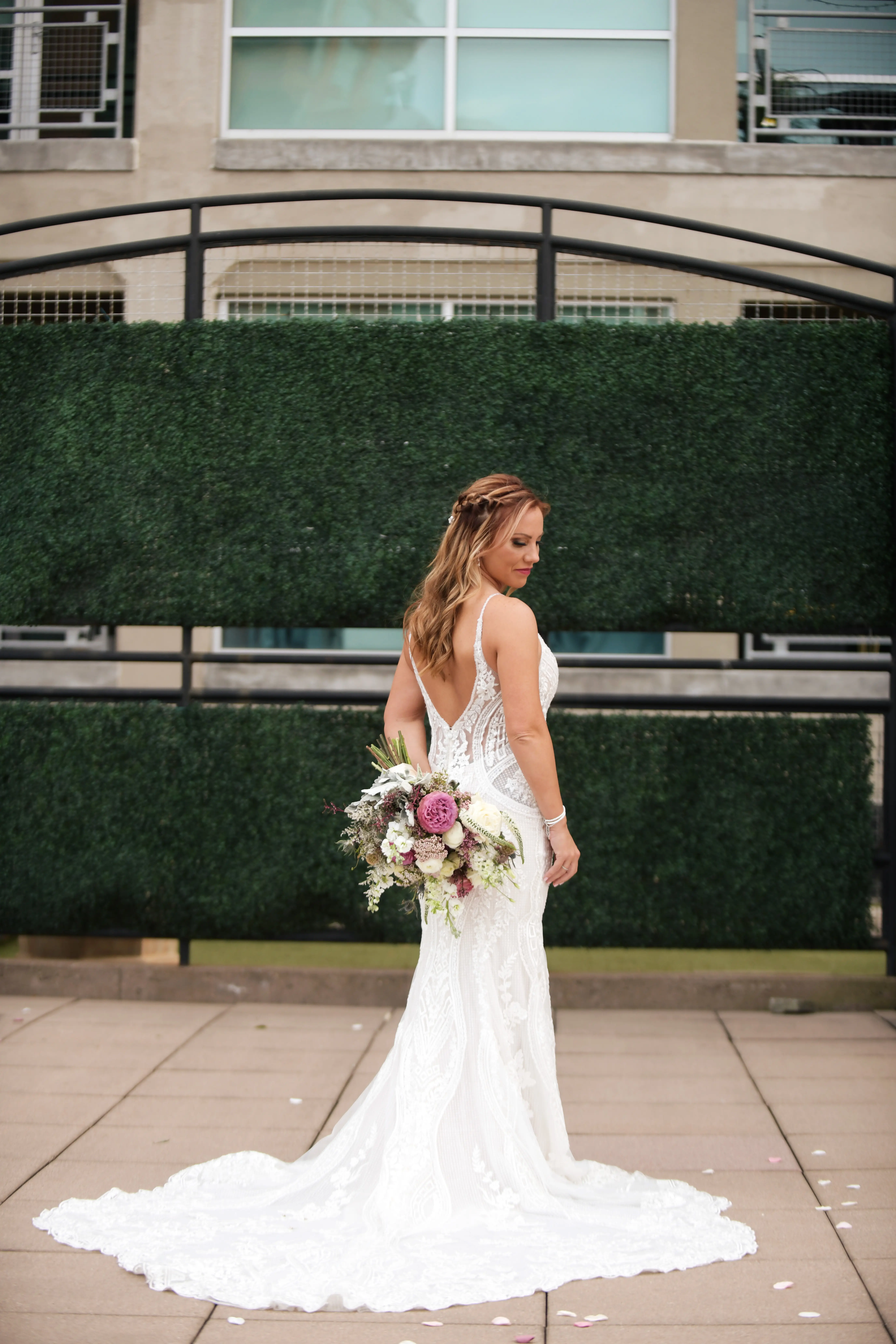 Bride in V-Neckline Wedding Gown Accented with Beaded Detail Called Bailey by Sottero & Midgley