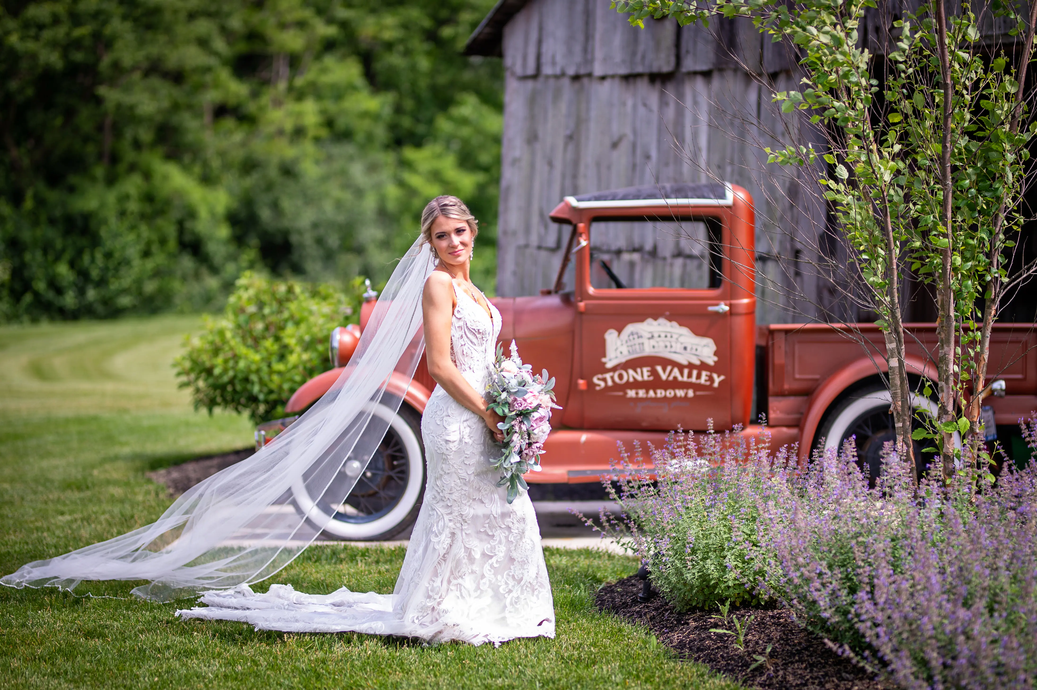 Bride in Elegant Lace Sheath Wedding Dress with Beaded Lace Motifs over Textured Tulle Called Hamilton by Sottero & Midgley