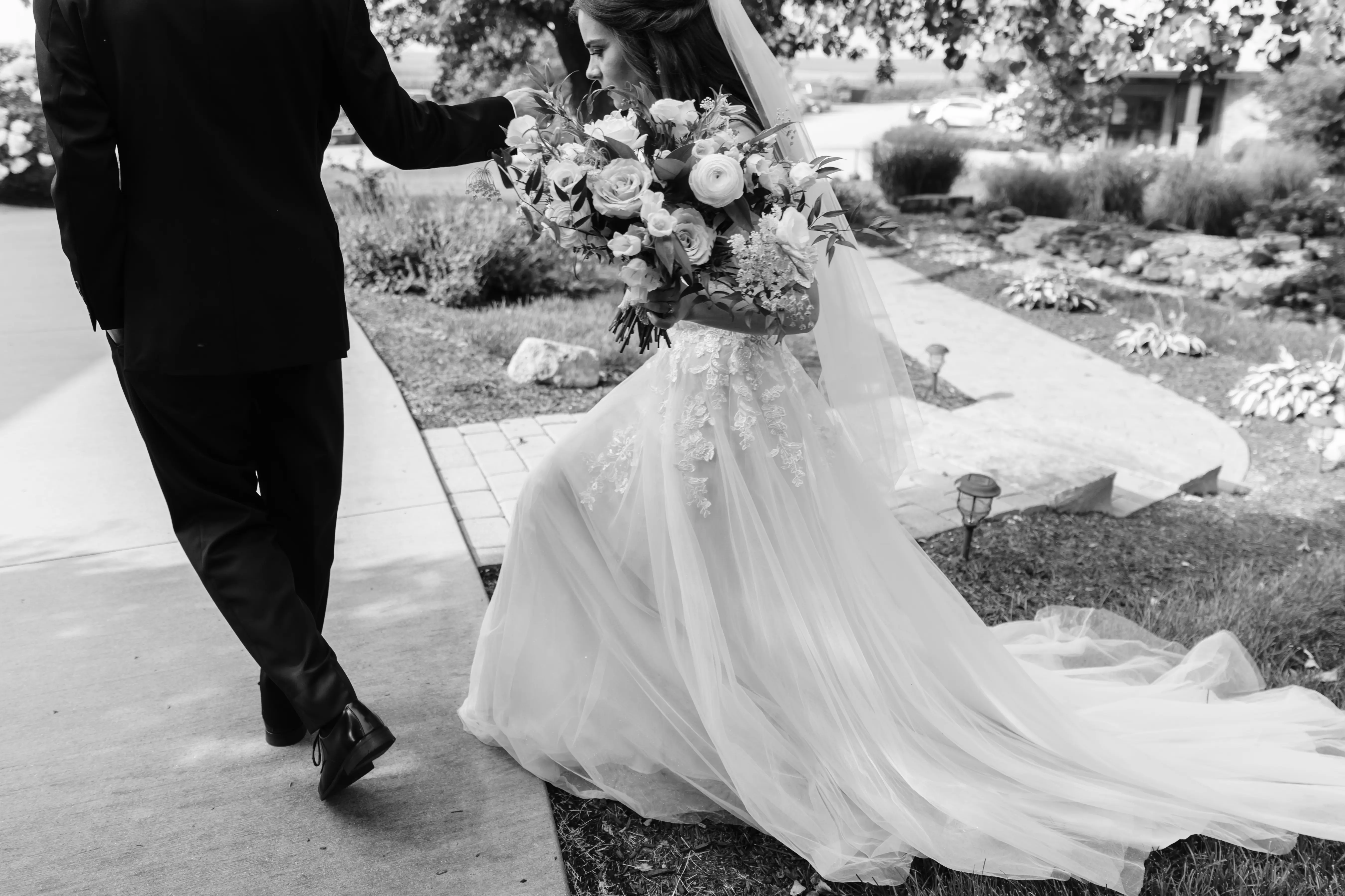 Groom With Bride Wearing A-Line Lace Wedding Dress With Customized Off The Shoulder Sleeves Stevie By Maggie Sottero