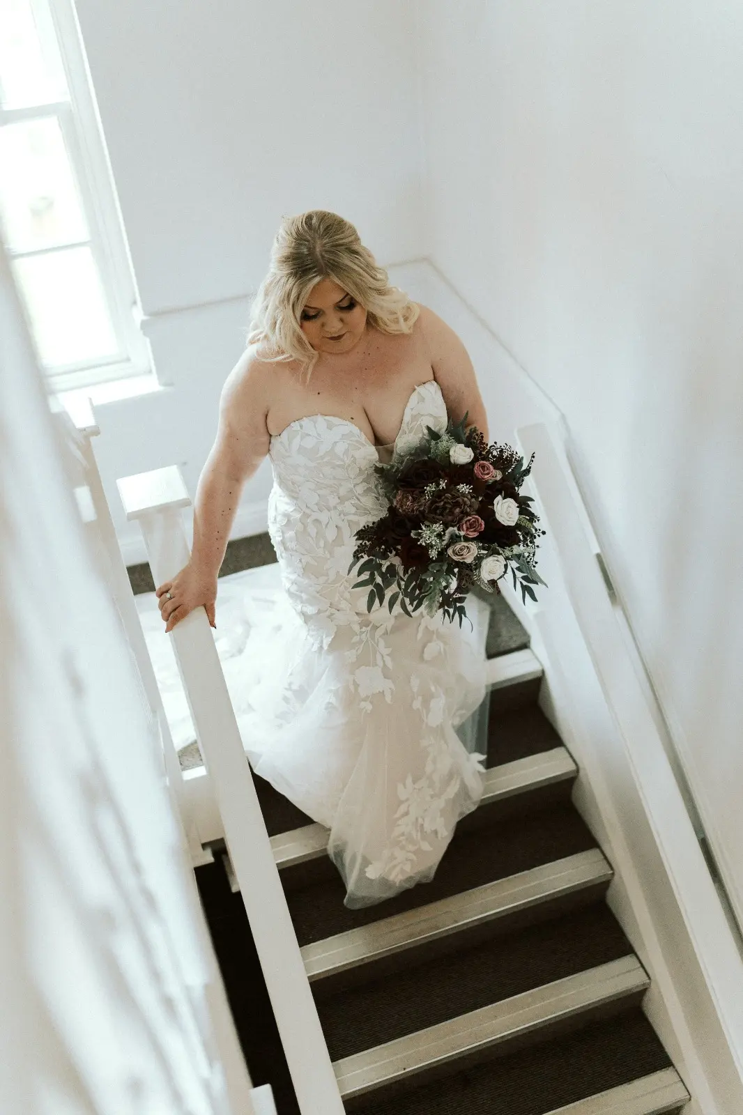 Bride Wearing Lace Mermaid Wedding Dress Called Hattie By Rebecca Ingram Walking Down The Stairs