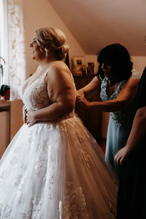 Bride Wearing Ball Gown With Shimmery Lace Motifs Valona By Sottero And Midgley