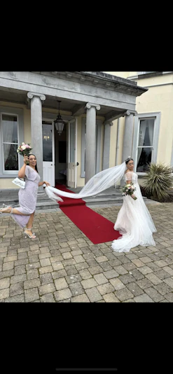 Bride In Wedding Dress With Flutter Sleeves Called Paige By Maggie Sottero