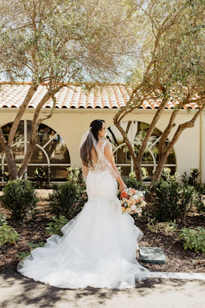 Bride Wearing Unique Trumpet Bridal Dress In Colorful Floral Lace Motifs Kenleigh By Sottero And Midgley
