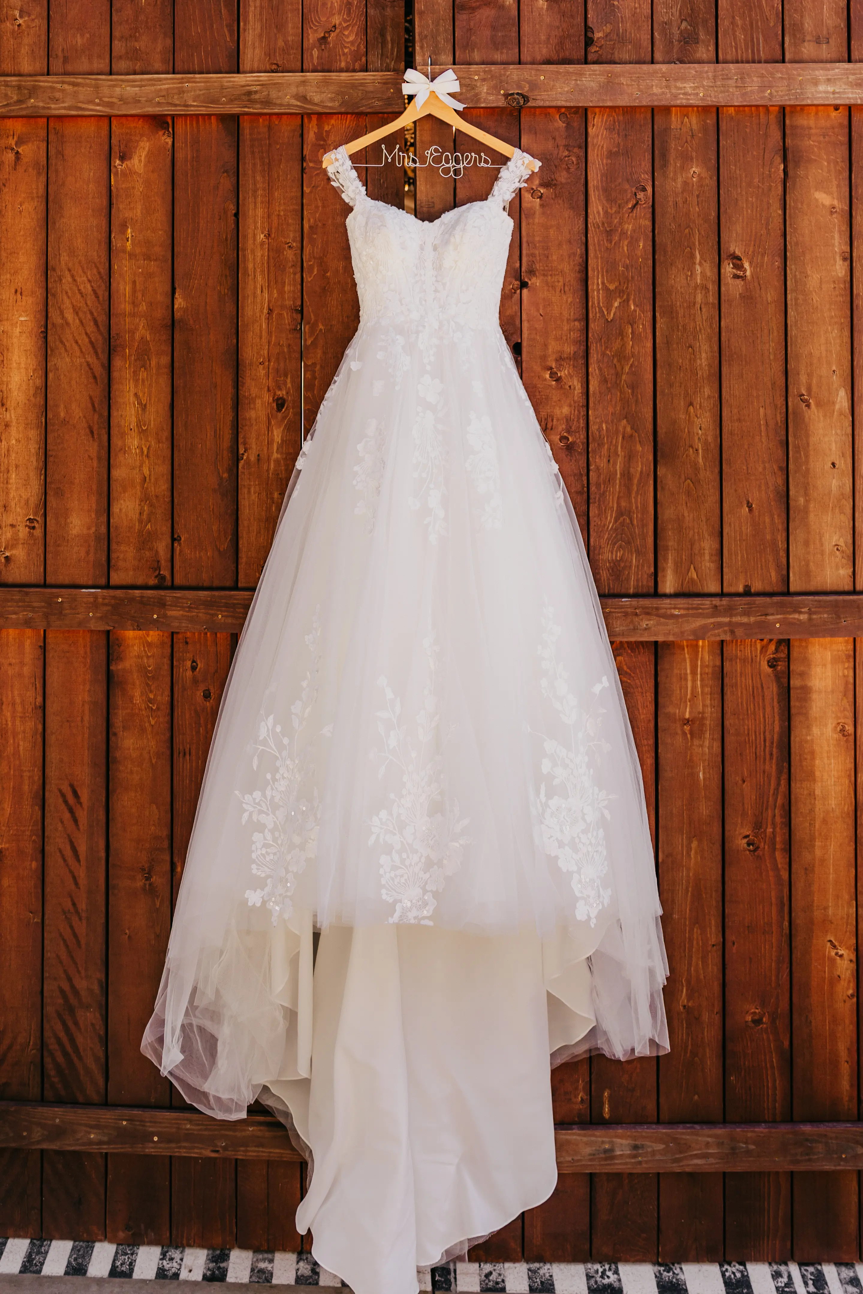 Harlem wedding dress by Maggie Sottero hanging up