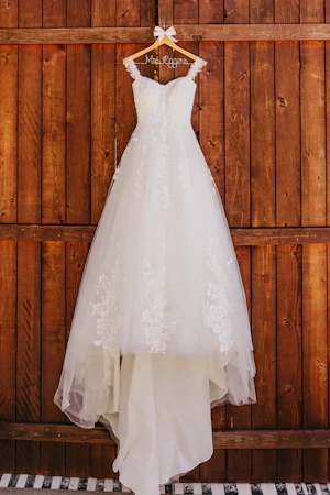 Harlem wedding dress by Maggie Sottero hanging up