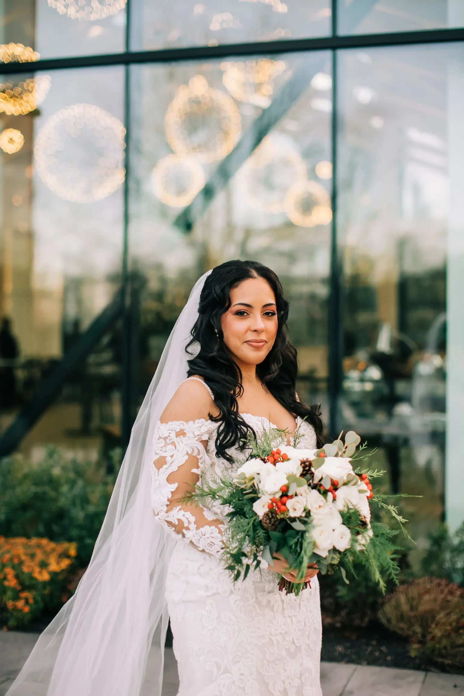 Bride Wearing Sexy Lace Wedding Dress Called Fiona By Maggie Sottero Holding A White Bouquet With Orange Berries