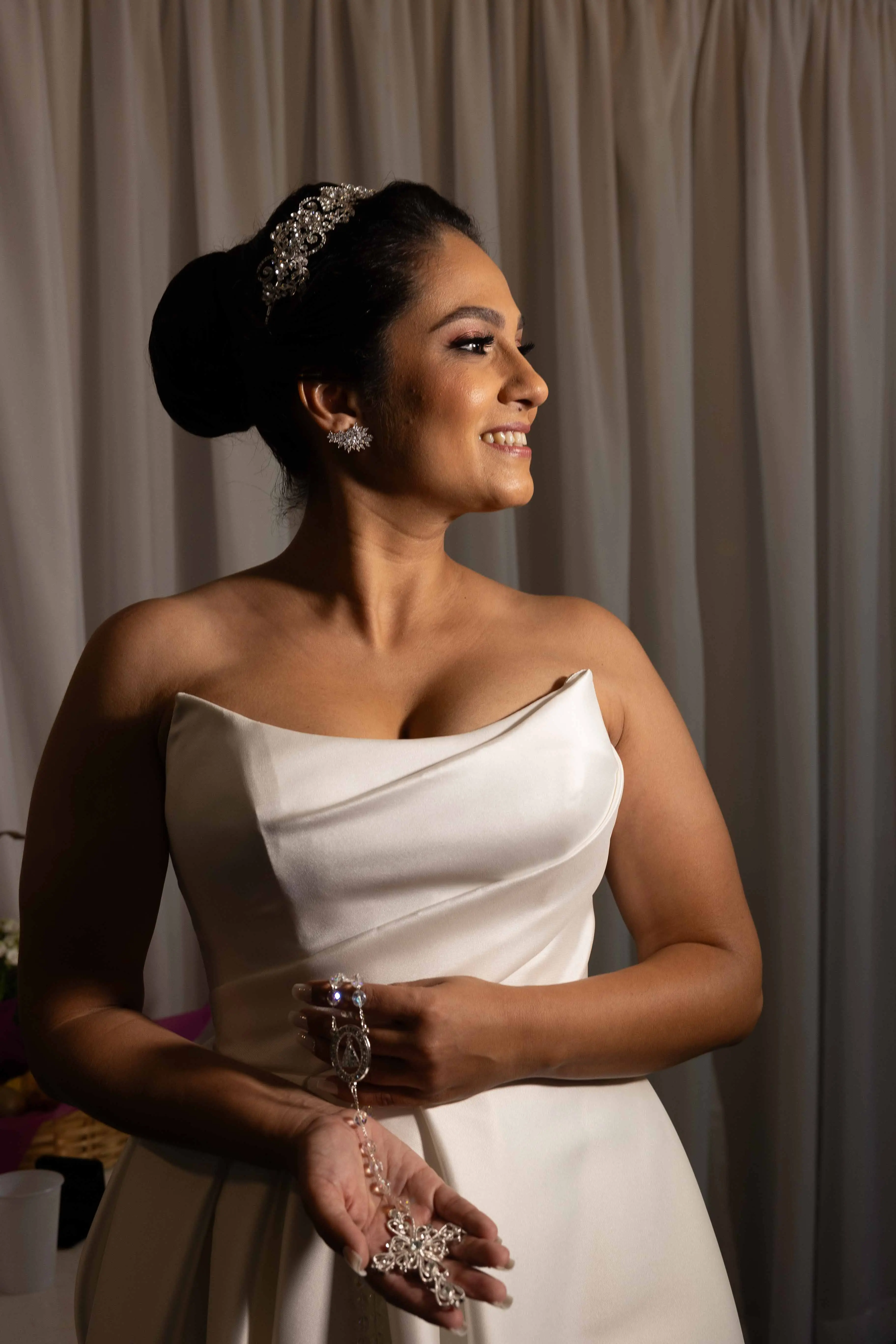 Bride wearing Aspen wedding dress by Sottero and Midgley