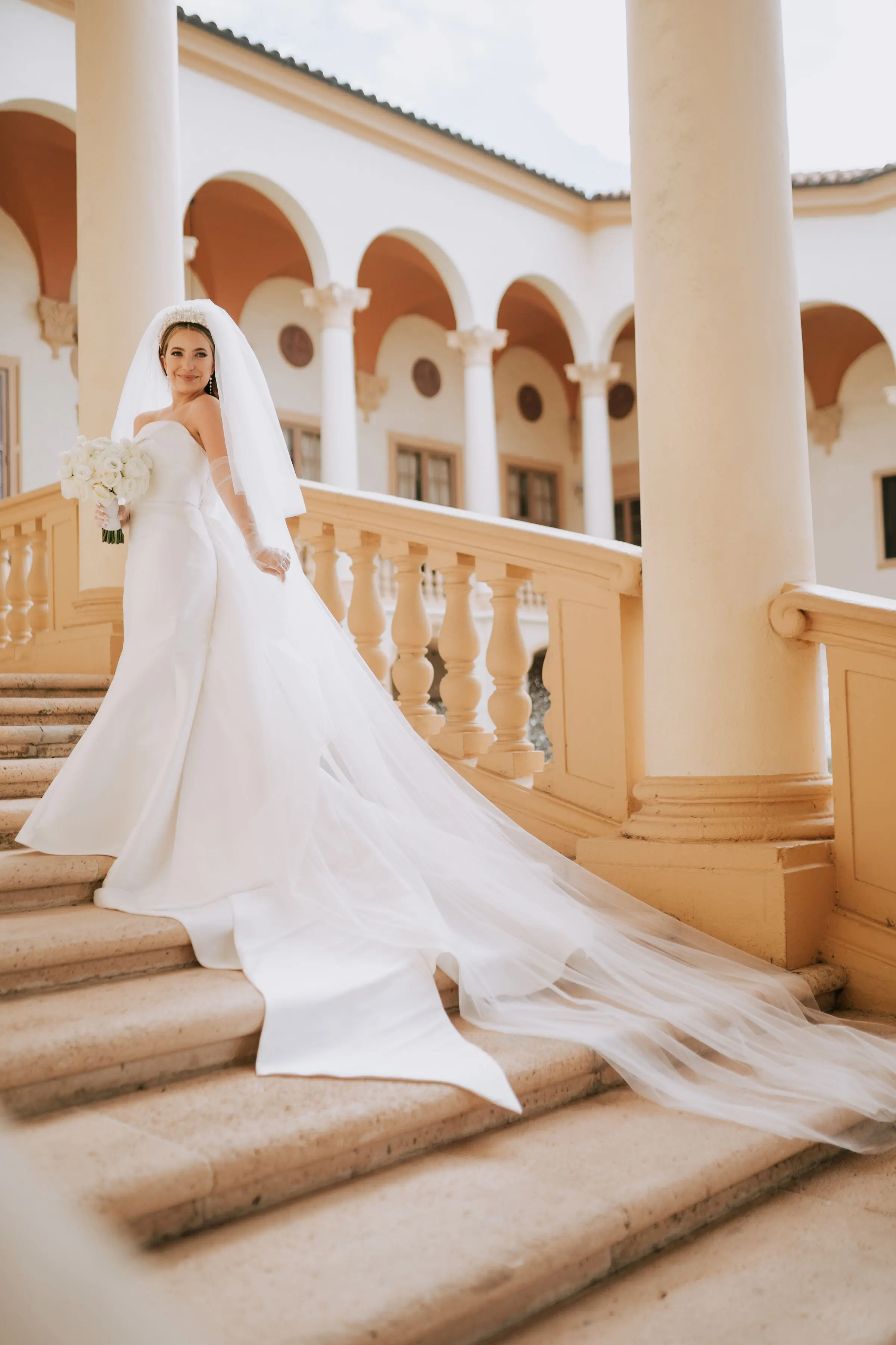 Bride Wearing Simple Sheath Satin Dress With Back Bow Mitchell By Maggie Sottero