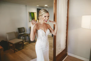 Real Bride in Fit-and-Flare Strapless Chiffon Wedding Gown with Sequined Lace Motifs over Chantilly Lace with Corset Detailing Called Giovannetta by Sottero & Midgley