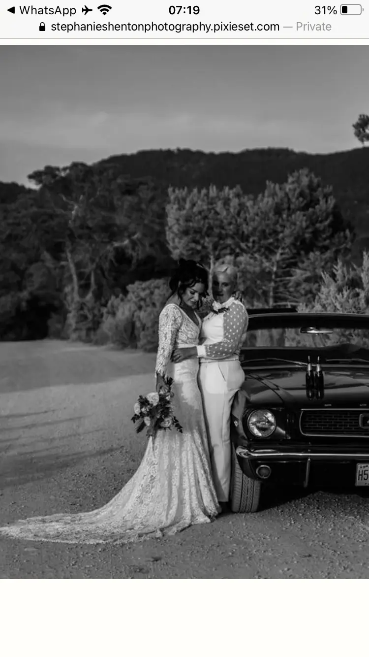 LGBTQ+ Couple With Bride In Lace Boho Wedding Dress Called Drita By Sottero and Midgley