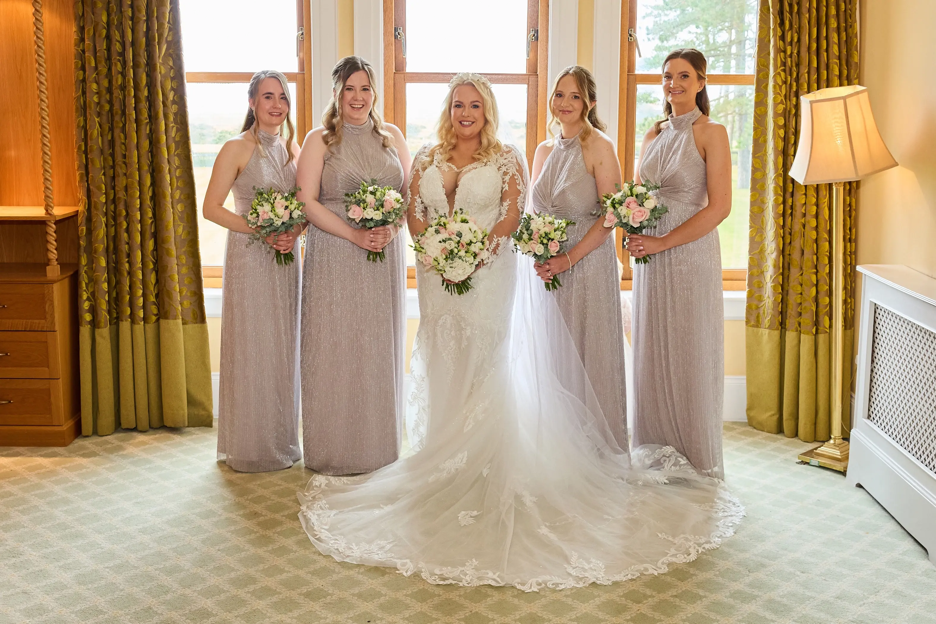 Bride wearing Saige by Maggie Sottero with her bridesmaids