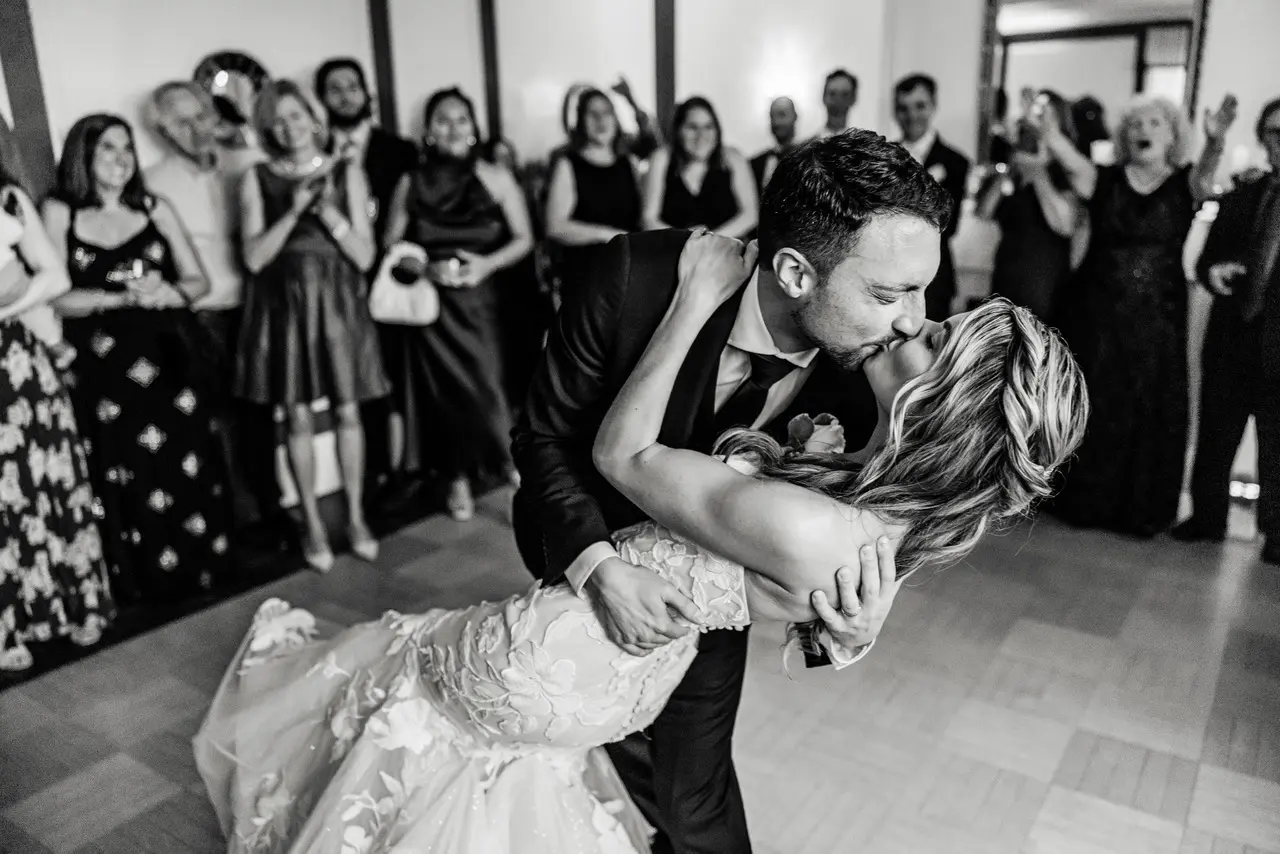 Bride wearing Hattie Marie by Rebecca Ingram kissing her husband