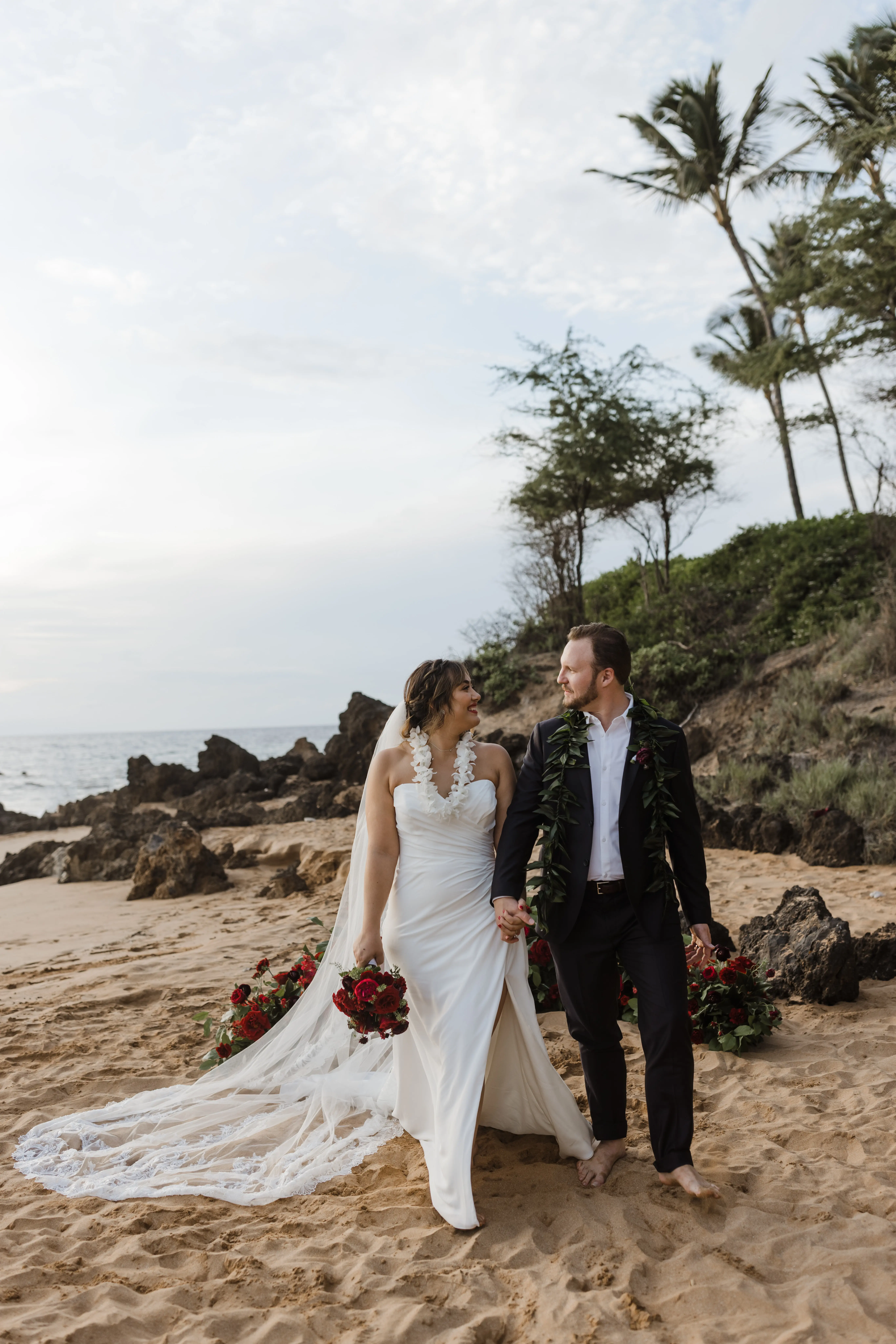 Bride On Beach With Groom In Strapless Wedding Dress Called Monaco By Maggie Sottero