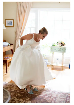 Bride Wearing Satin Ball Gown With Pockets Selena By Maggie Sottero