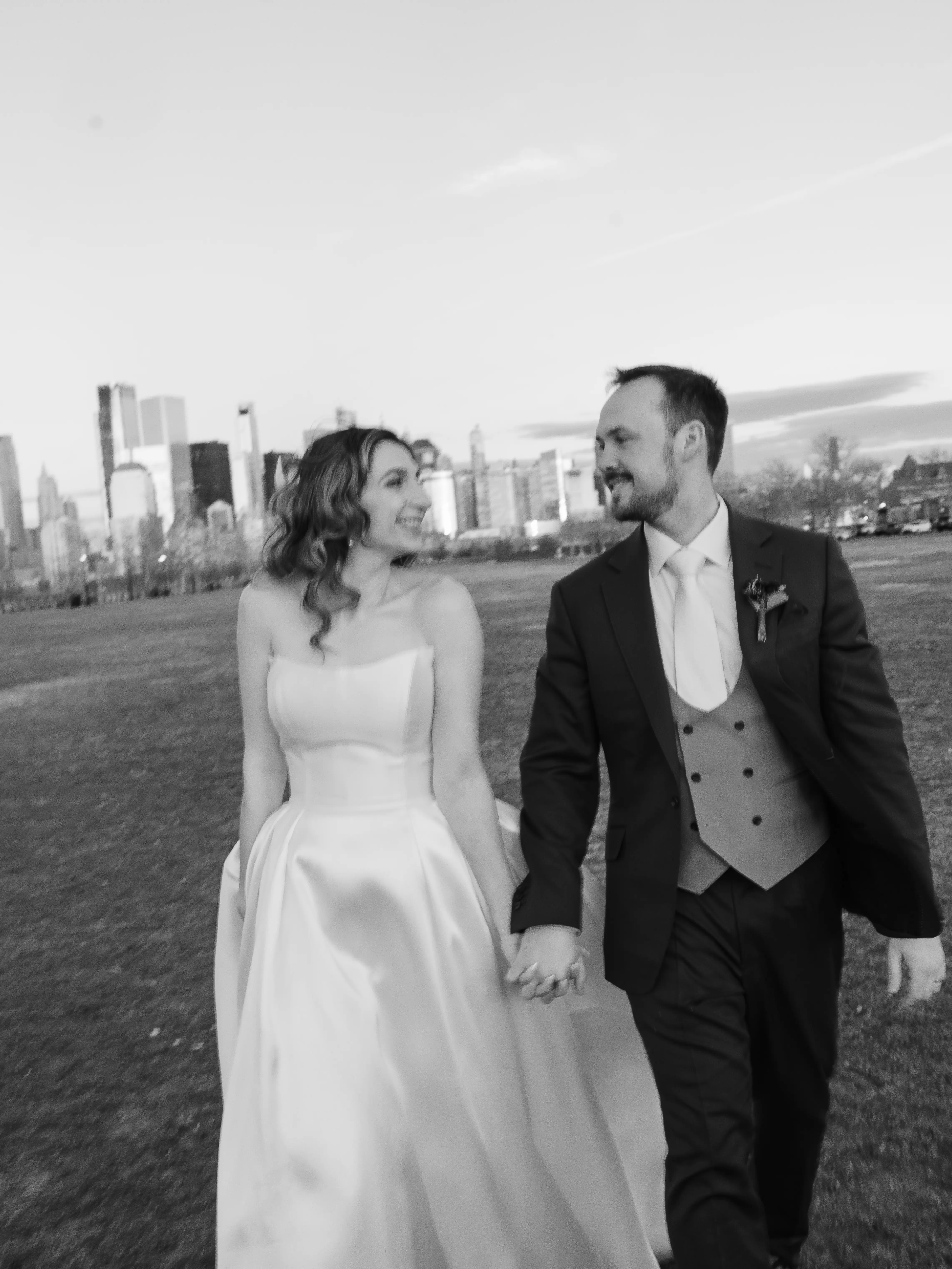 Bride wearing Selena by Maggie Sottero walking with her husband