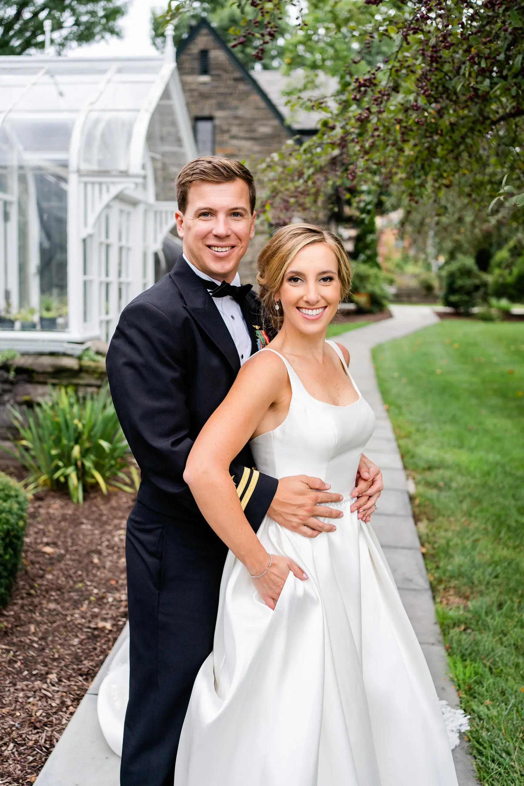 Bride wearing Simple Ballgown Wedding Dress called Selena by Maggie Sottero with the groom