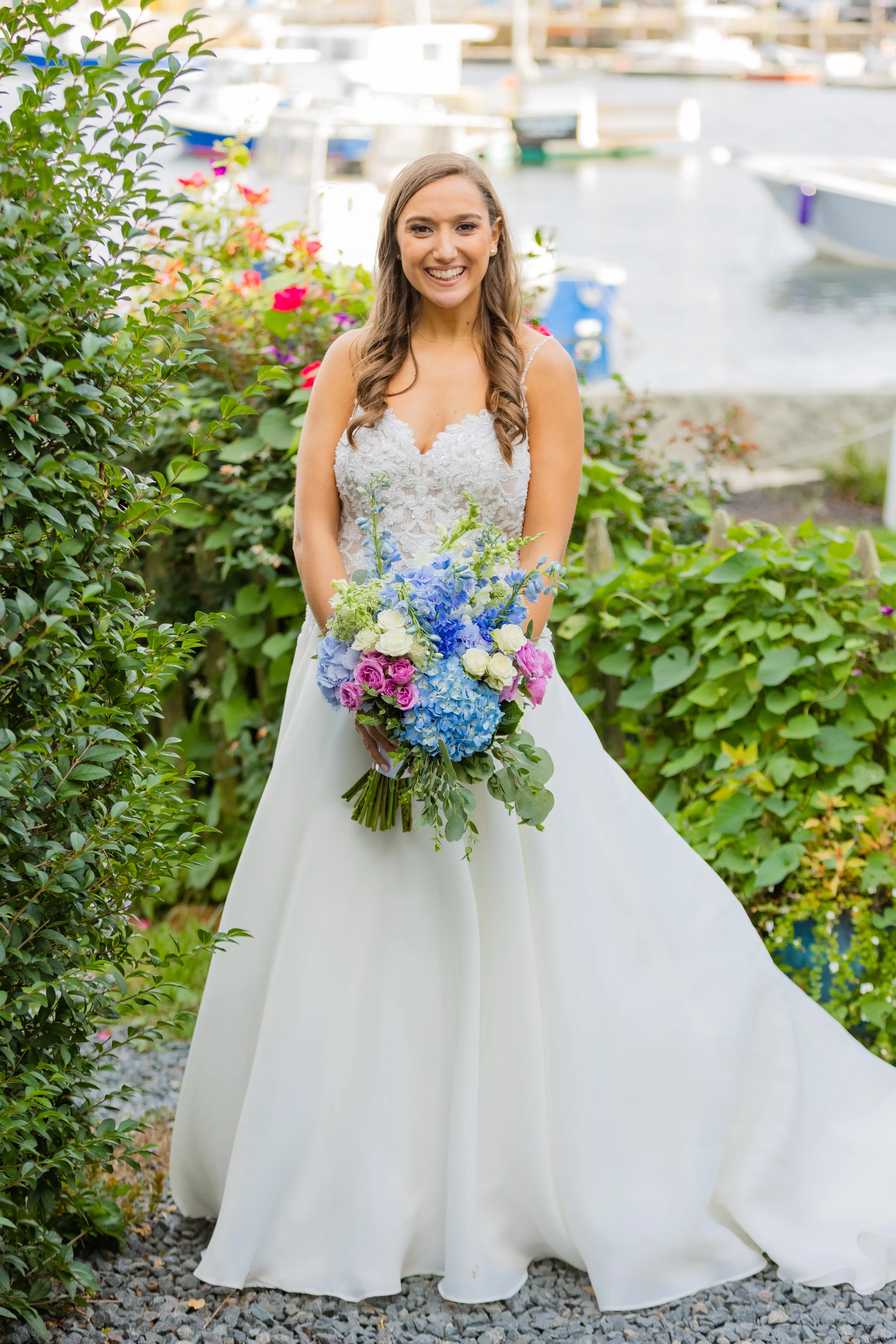 Bride in Flirty A-Line Wedding Dress with Beaded Lace Motifs and Sheer Bodice Called Savannah by Maggie Sottero