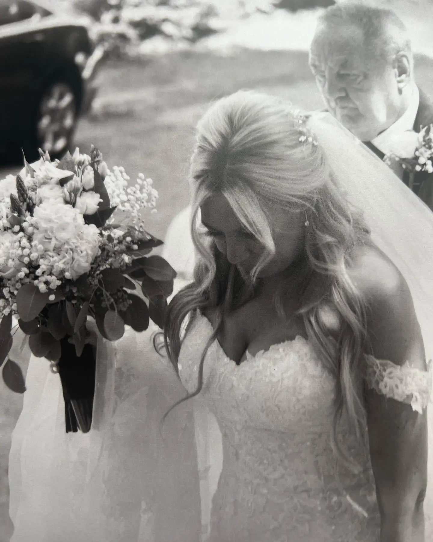 Bride Wearing Fit And Flare Lace Wedding Dress With 3D Floral Details Called Ryker By Sottero And Midgley