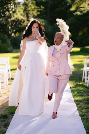 Bride wearing Aspen by Sottero and Midgley with her partner