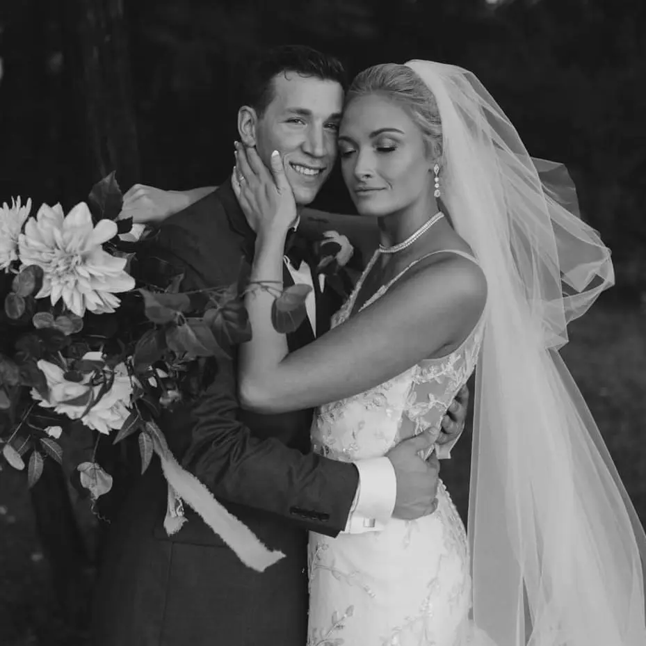 Groom With Bride Wearing Trumpet Wedding Dress With Colorful Floral Lace Motifs Kenleigh By Sottero And Midgley