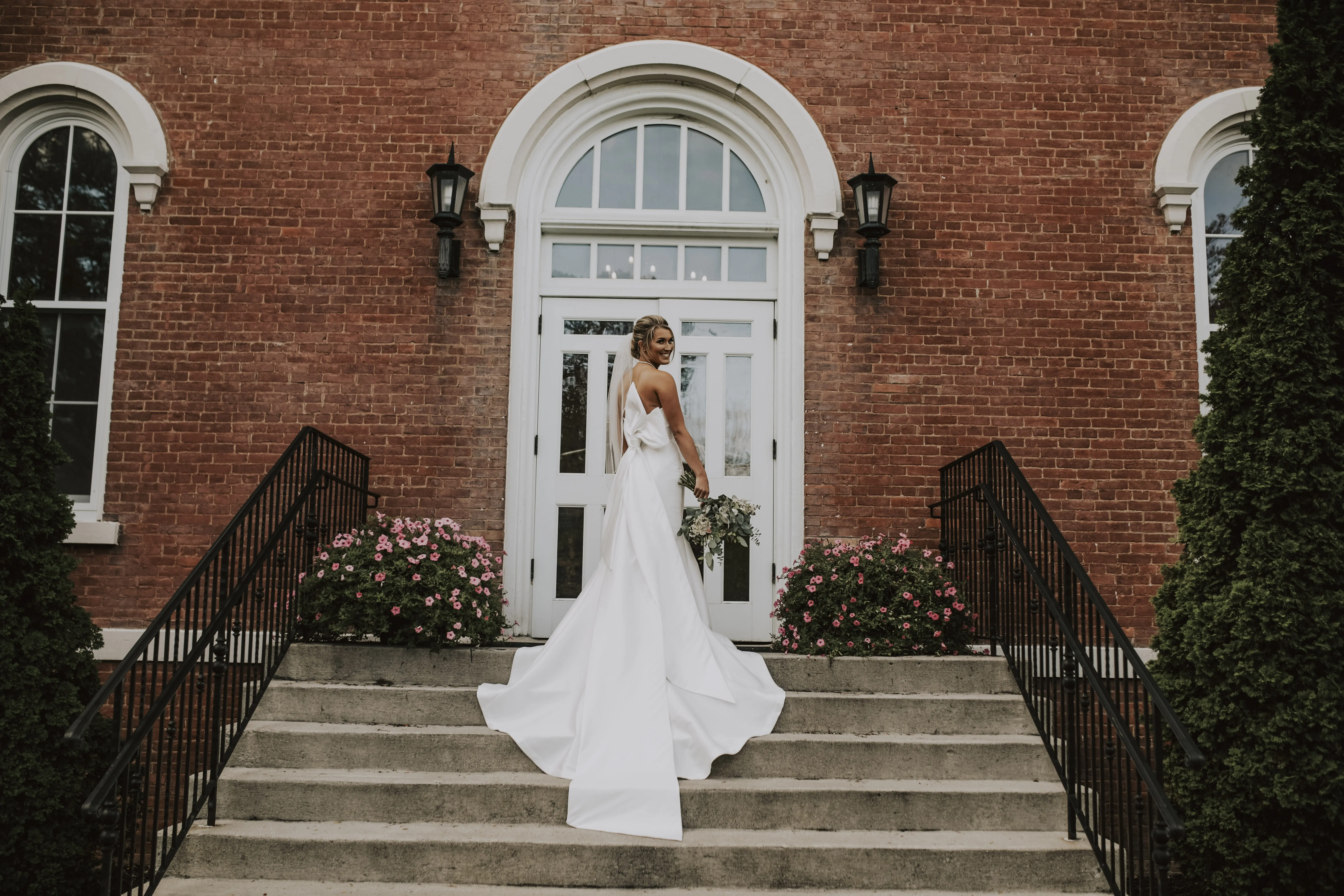Bride wearing Mitchell wedding dress by Maggie Sottero
