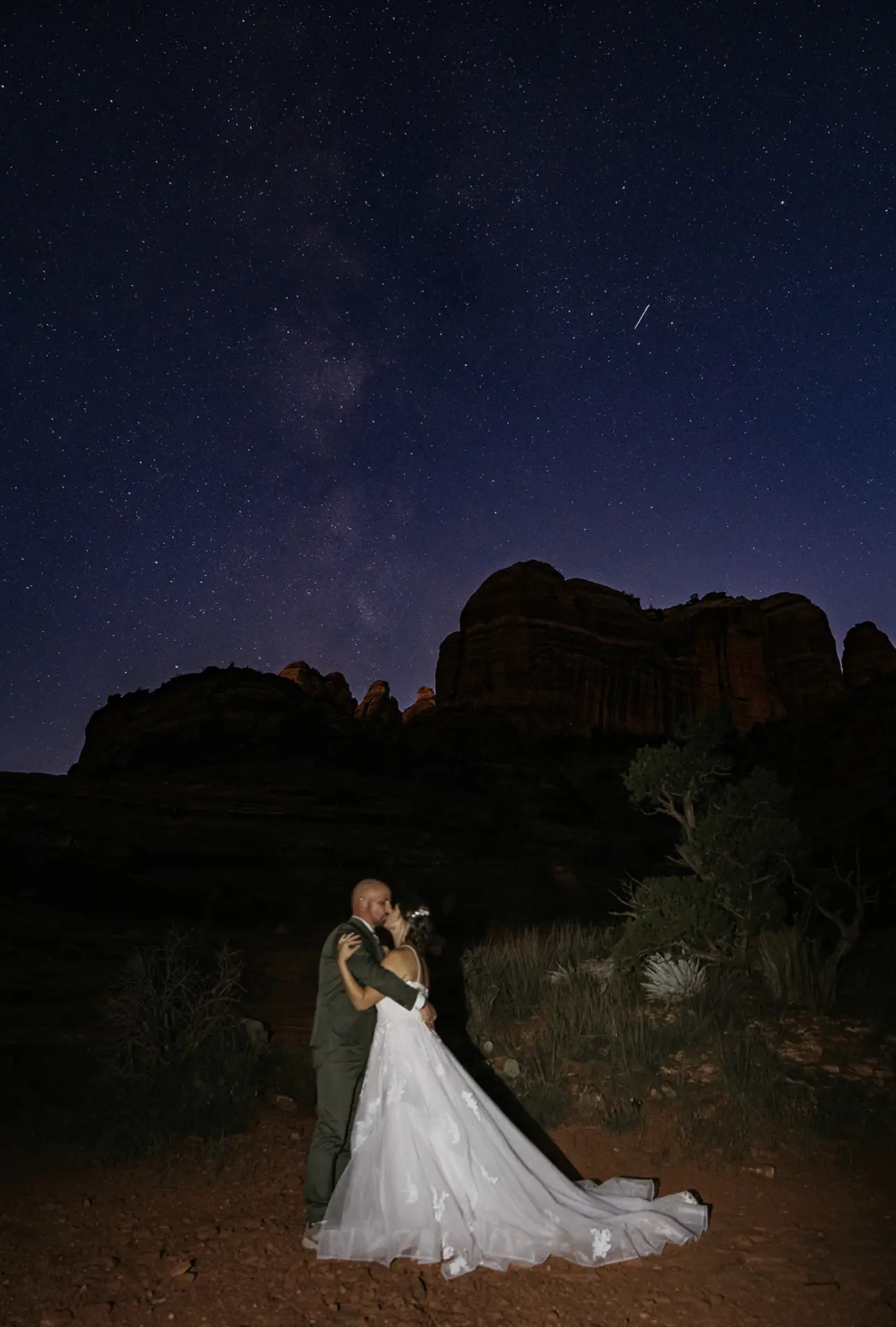 Groom Kissing Bride In Tulle Garden Inspired Wedding Dress Named Lettie By Rebecca Ingram